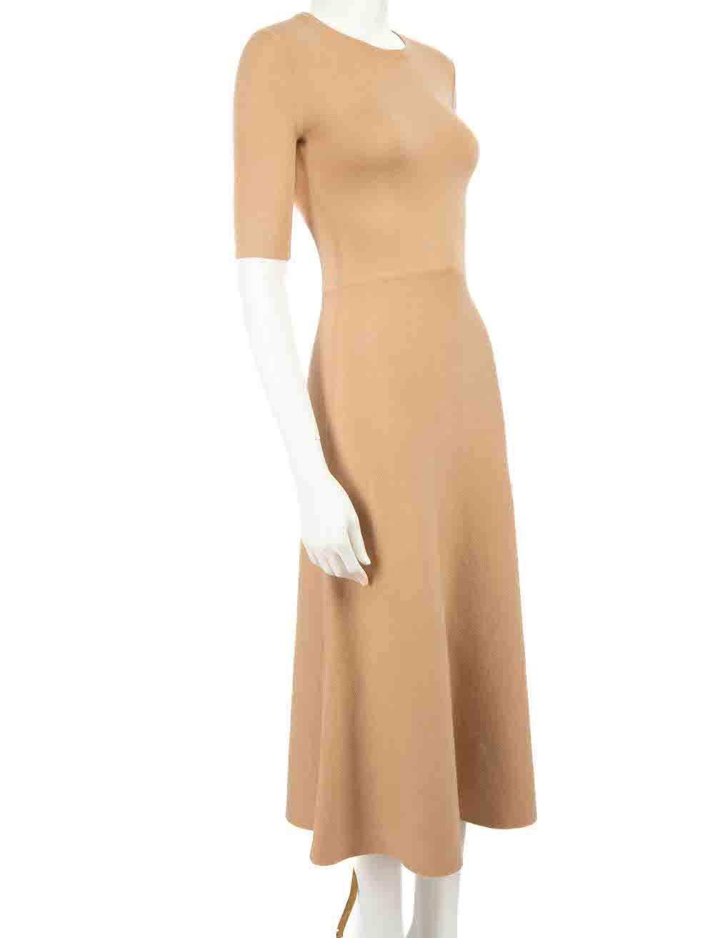 CONDITION is Very good. Minimal wear to dress is evident. Minimal wear with light pilling to the front, back and lining on this used Gabriela Hearst designer resale item.
 
 Details
 Camel
 Wool
 Knit dress
 Short sleeves
 Midi
 Round neck
 
 
 Made