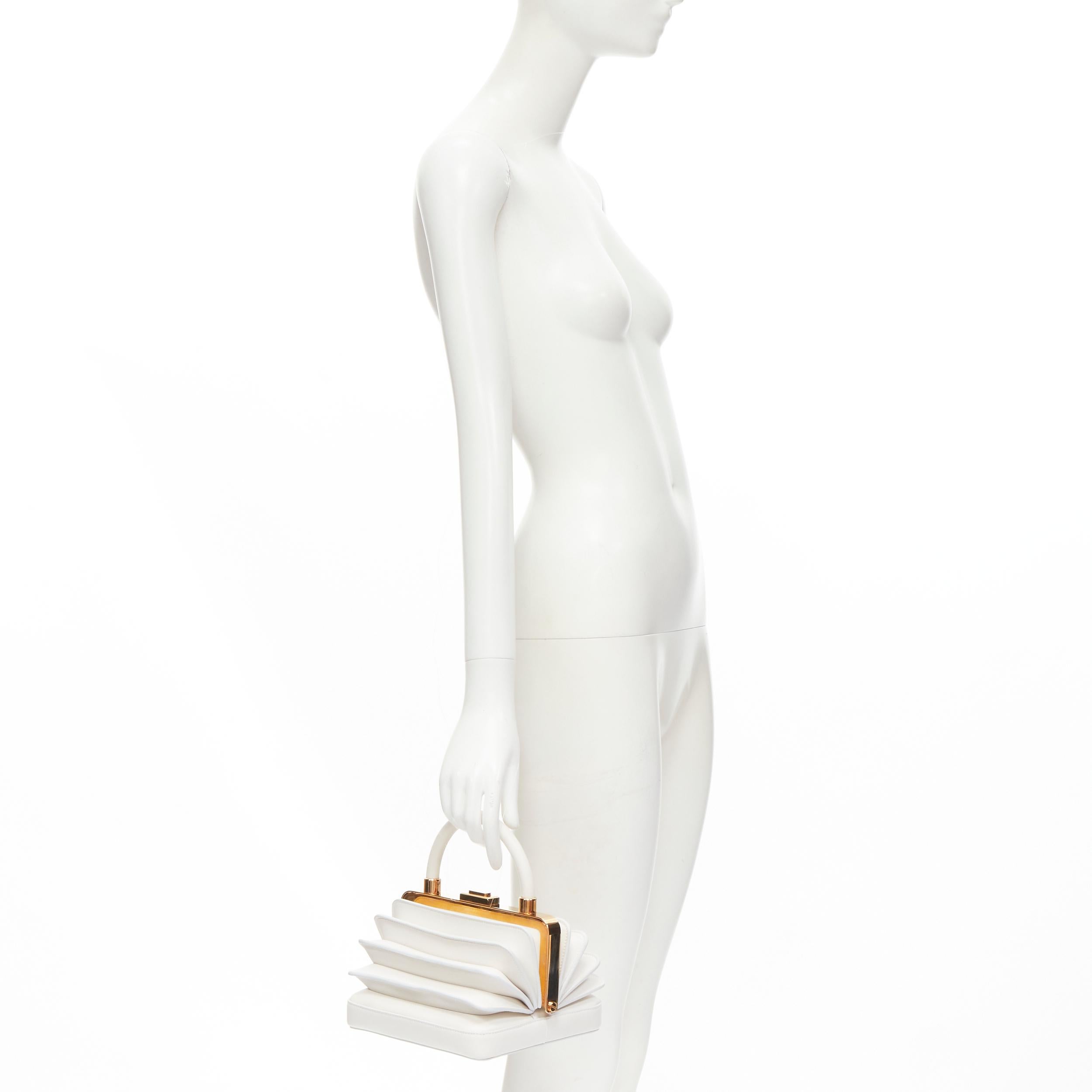 GABRIELA HEARST Diana white nappa leather rose gold accordion bag 
Reference: LNKO/A01923 
Brand: Gabriela Hearst 
Model: Diana bag 
Material: Leather 
Color: White 
Pattern: Solid 
Closure: Push Clasp 
Extra Detail: Signature Diana bag. White