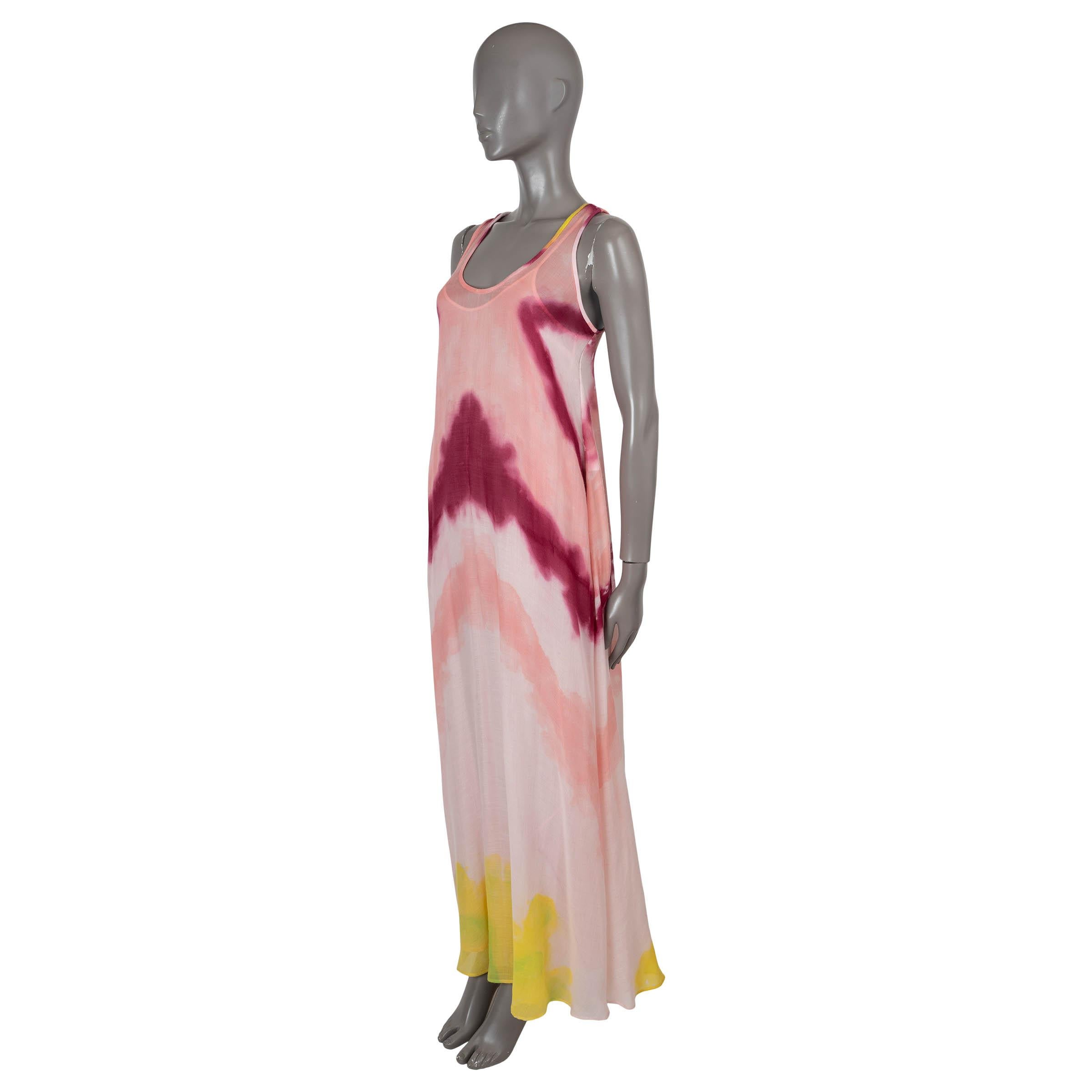 100% authentic Gabriela Hearst Niki maxi dress in light pink, pink and yellow tie-dye cashmere (100%). Features a sleeveless, flowing silhouette with floor sweeping length, scoop neck and racer back. Lined in light pink silk (100%). Has been worn