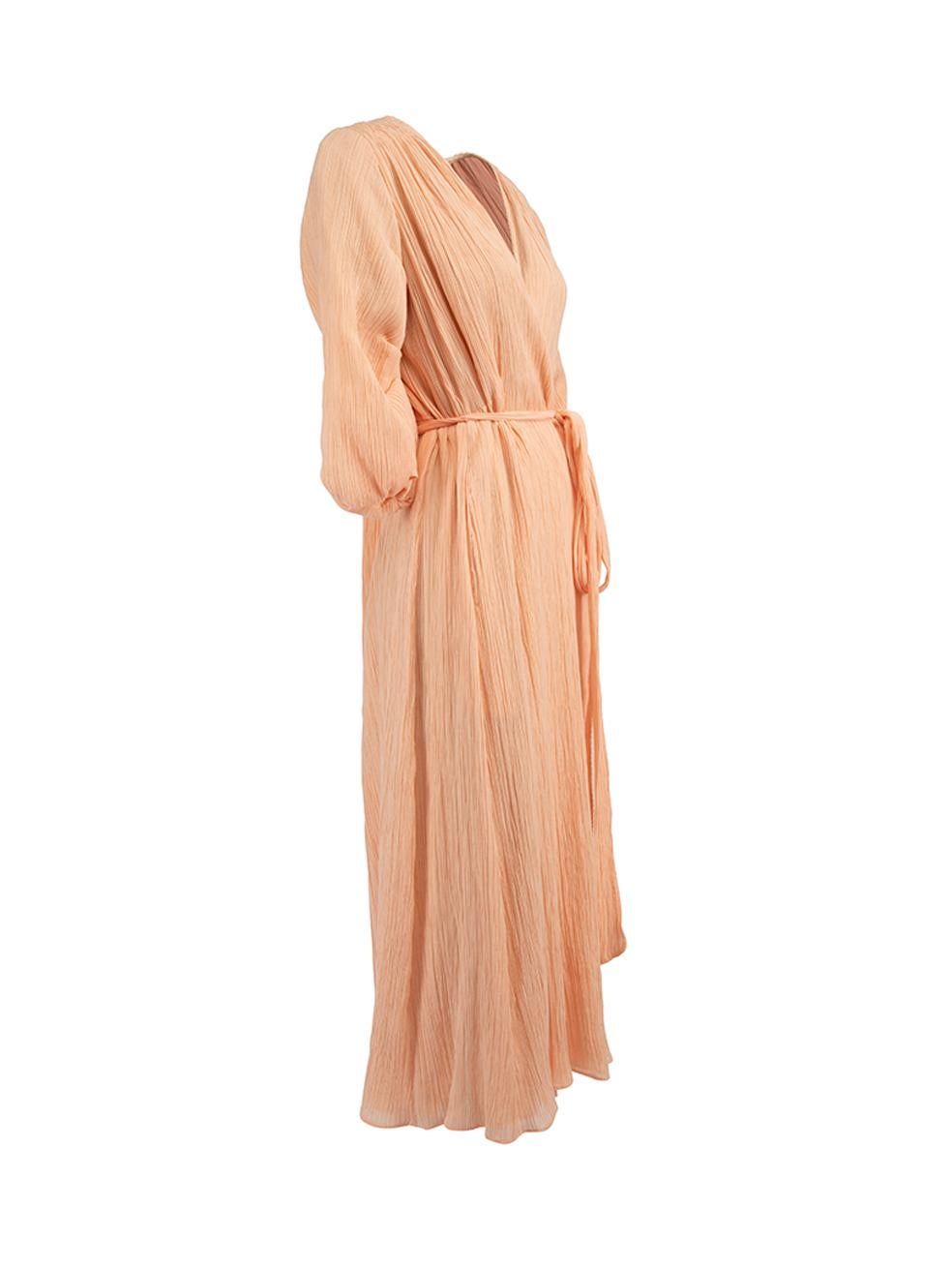 CONDITION is Very good. Hardly any visible wear to dress is evident on this used Gabriela Hearst designer resale item.  Details  Light salmon Cotton, silk blend Long sleeves V neck Wrap dress with waist tie Puff sleeves Pleated texture Midi length