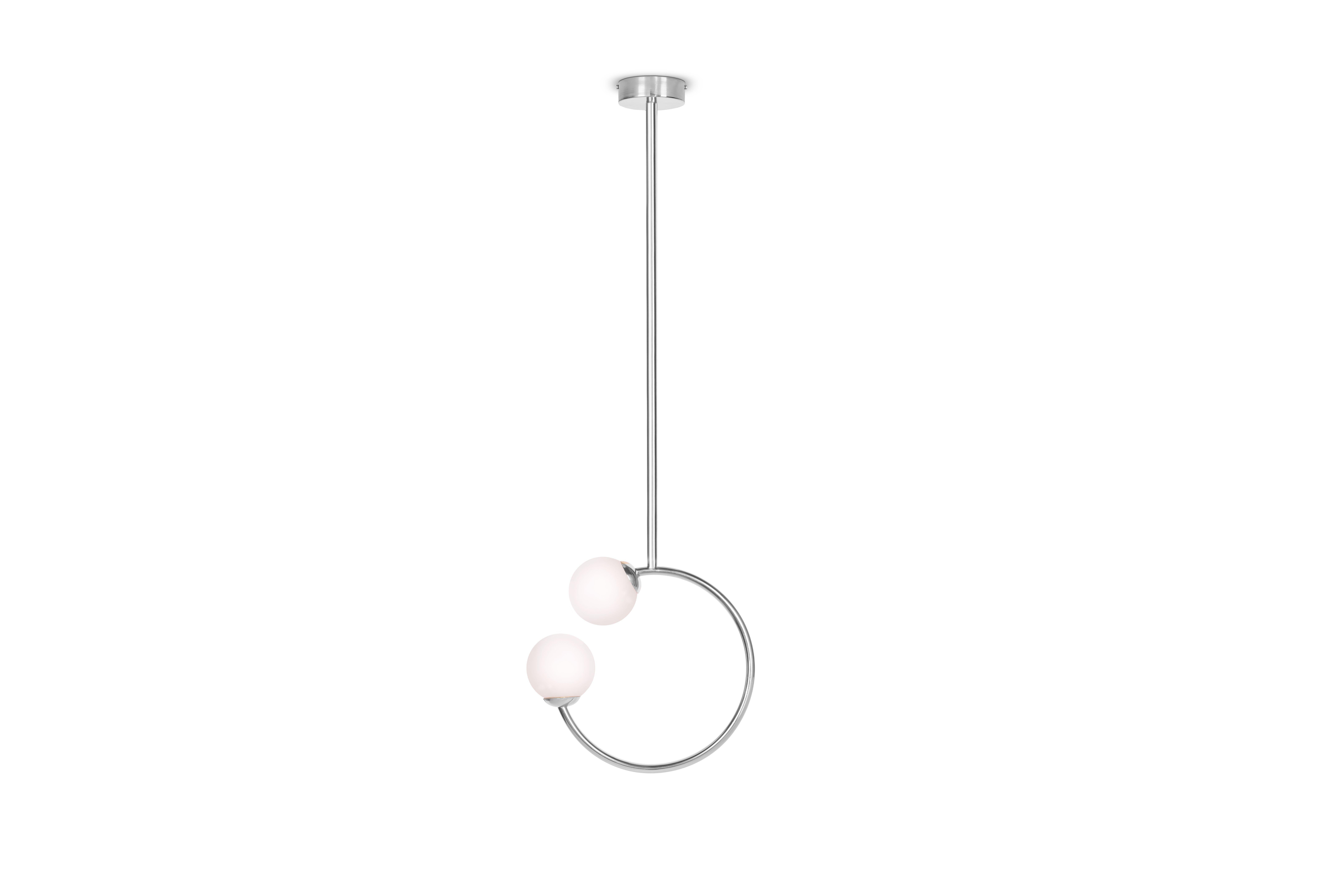 Gabriela stainless steel ceiling lamp, royal stranger
Dimensions: W 36 x D 14 x H 114 cm
Materials: Body Polished brass. Glass balls Blown glass opal diffuser.


Inspired by the femininity and using bold and vibrant color schemes, this