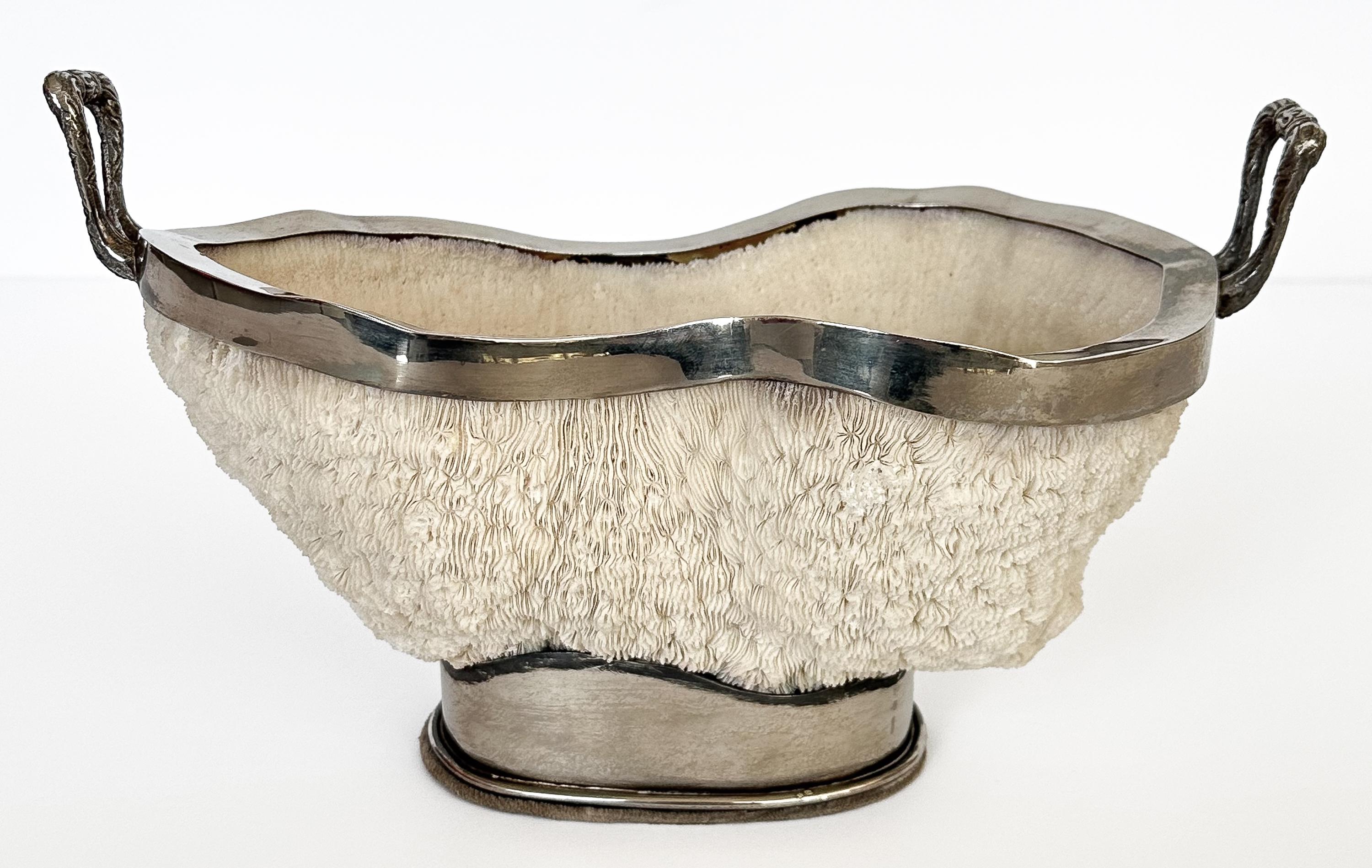 An exquisite bowl  in natural coral and silver by Gabriella Binazzi, Italy circa 1970s. This piece perfectly embodies Binazzi's signature style, which marries the wonders of the natural world with the sophistication of fine design.

The bowl's focal
