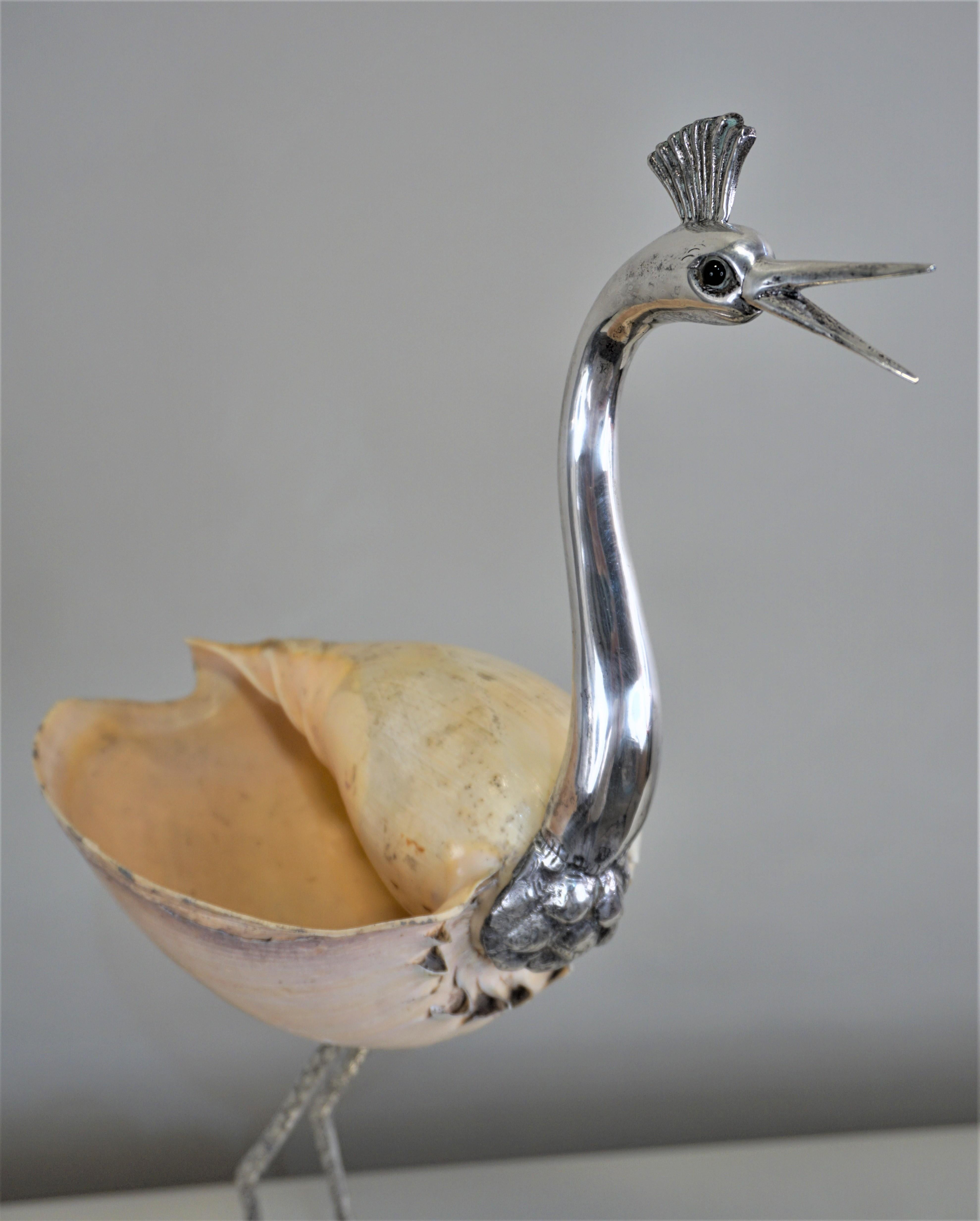 Beautiful handcrafted Italian sculpture of a standing bird of in silver plated and natural seashell by Gabriella Binazzi.