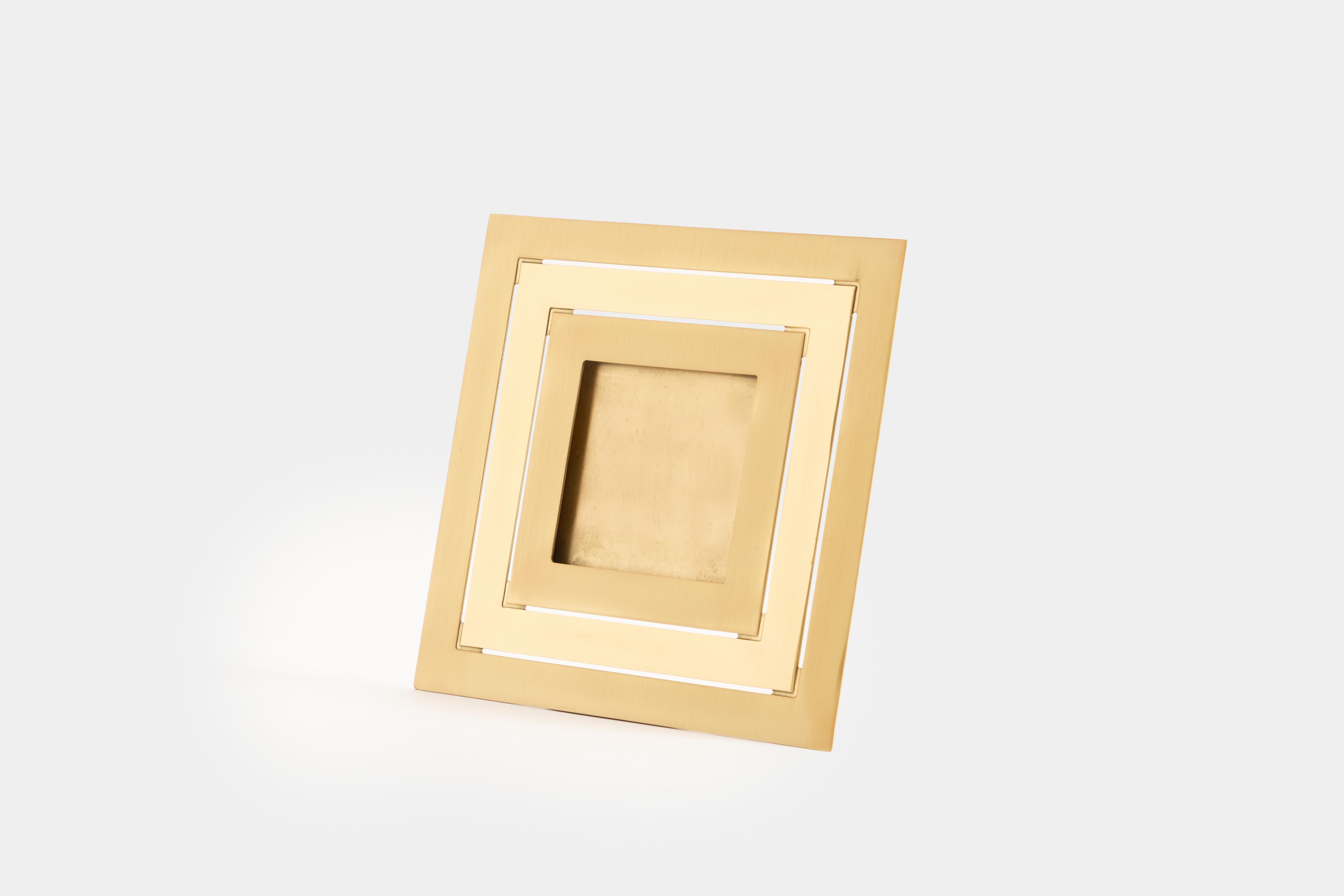 Gabriella Crespi square picture frame with alternating bands of brushed and polished brass, Italy, 1973.
Signed to reverse 