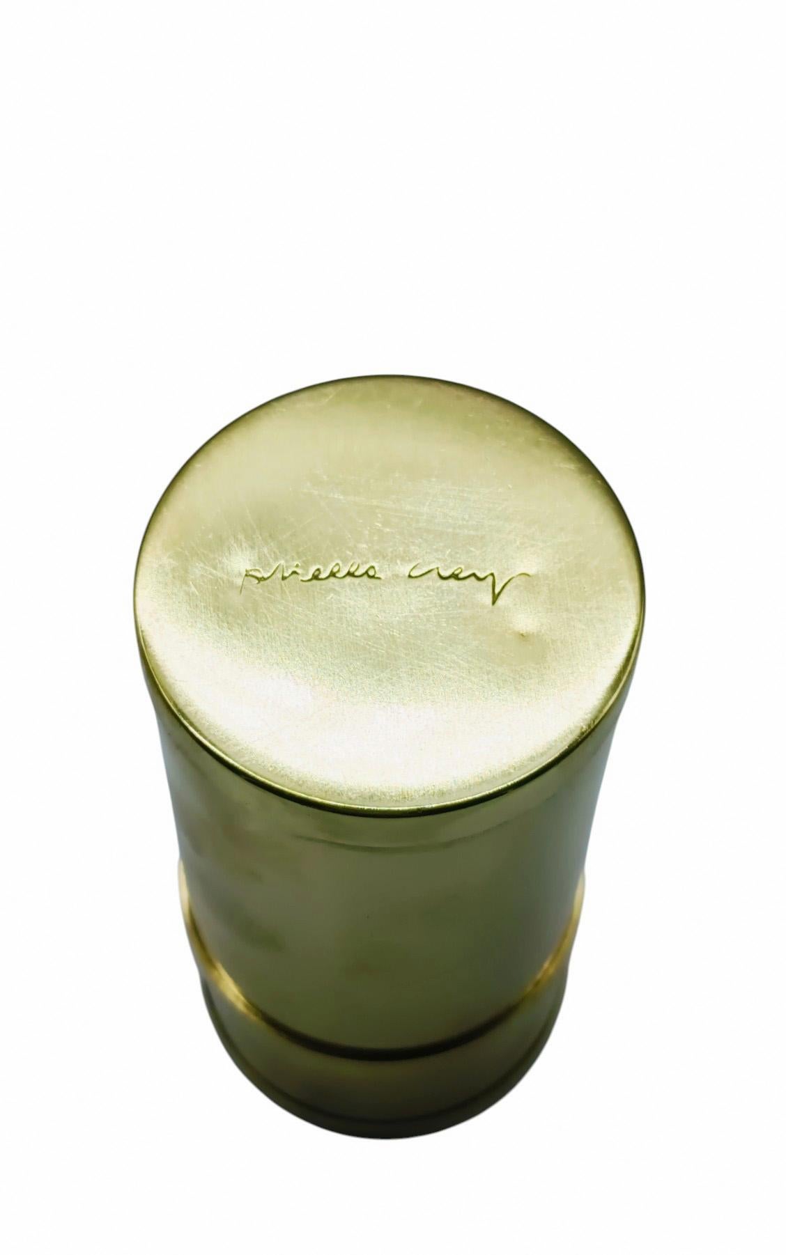 Small box  cylindrical beautifully crafted by Italian designer Gabriella Crespi, dating back to the 1970s. This exquisite piece is crafted in brass, showcasing Crespi's signature minimalist yet elegant design style. The box features an extraordinary