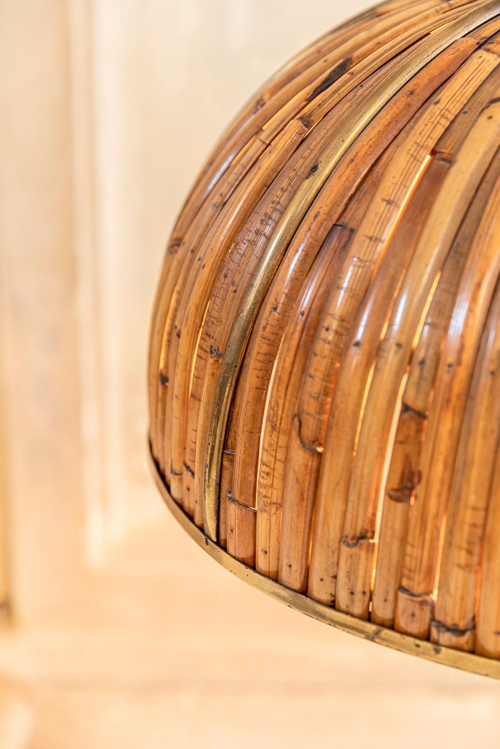 Gabriella Crespi 'Fungo' table lamp from the Rising Sun Series. 
This rare table lamp from the Rising Sun Series was made of golden brass, while the dome shade was made of many bamboo sticks edged with a brass ring. Also the details were made of