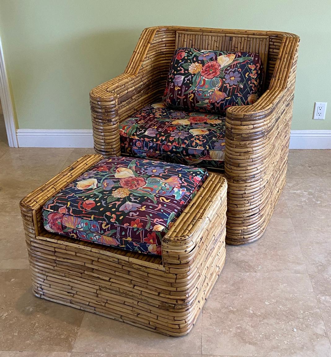 Hollywood Regency period bamboo rattan lounge or club chair Designed in Art Deco style with modern lines. The use of natural rattan gives the chair and ottoman an organic feel. Chair 35.5 inches wide by 33 deep by 34 high -- matching ottoman