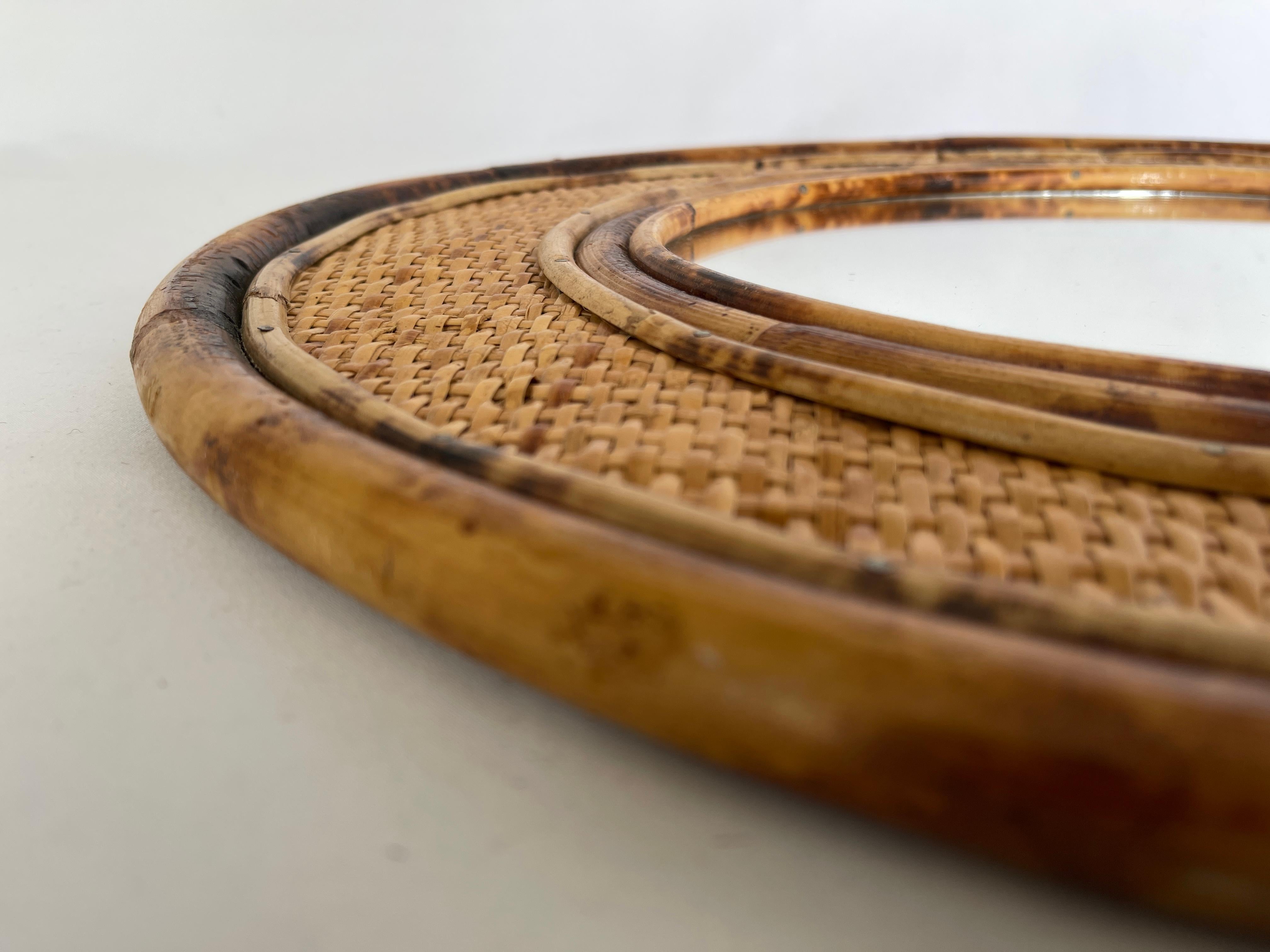  1970's Bamboo Framed Rattan Oval Mirror In Excellent Condition In New York, NY