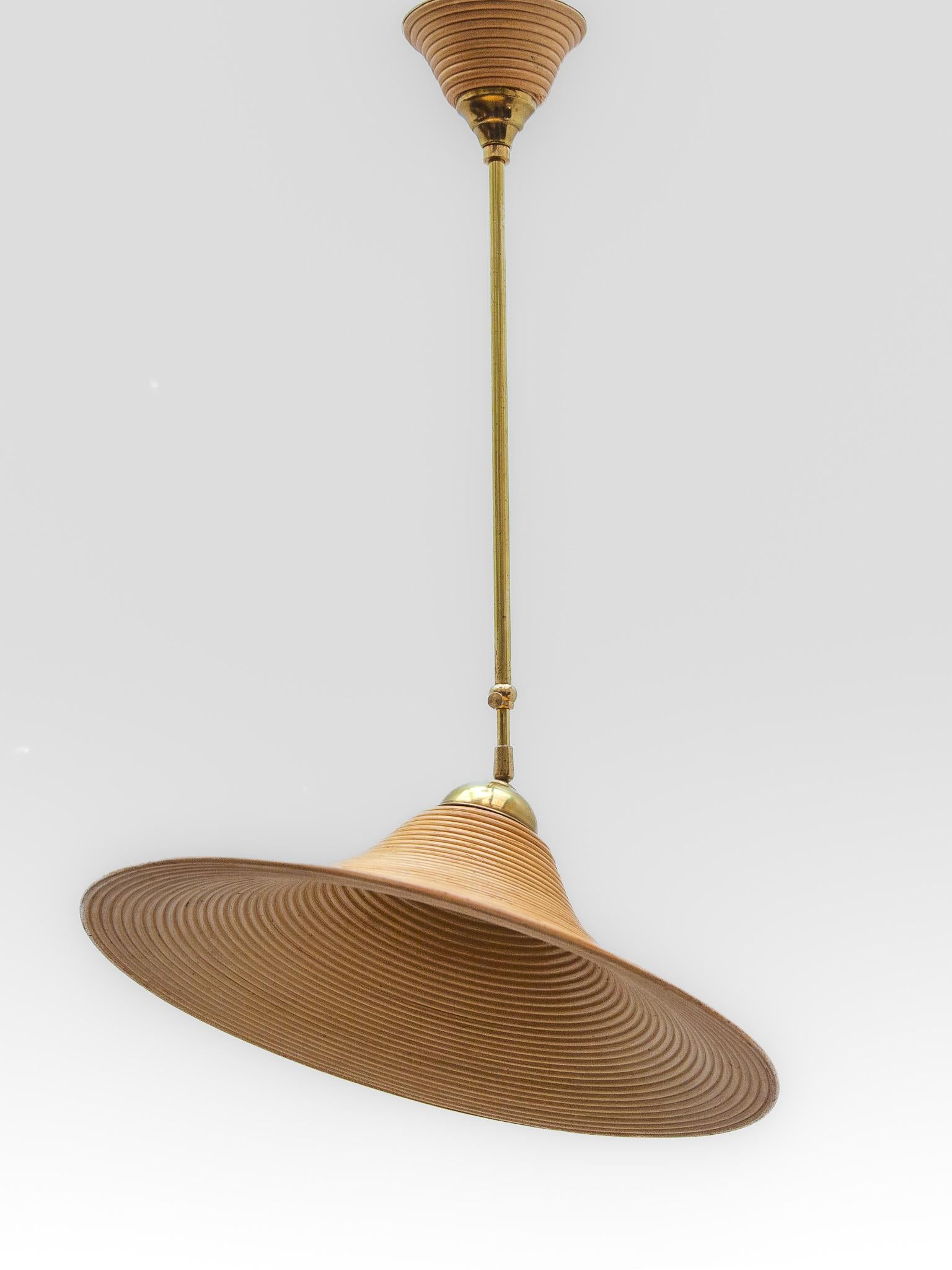 Large Spiral-wrapped pencil reed pendant in diabolic shape, Italy 1970s, the stem can be extend by pulling out at 80-130 cm and with a rotating technique, the shade can be placed in various positions where the light is needed. This stylish vintage