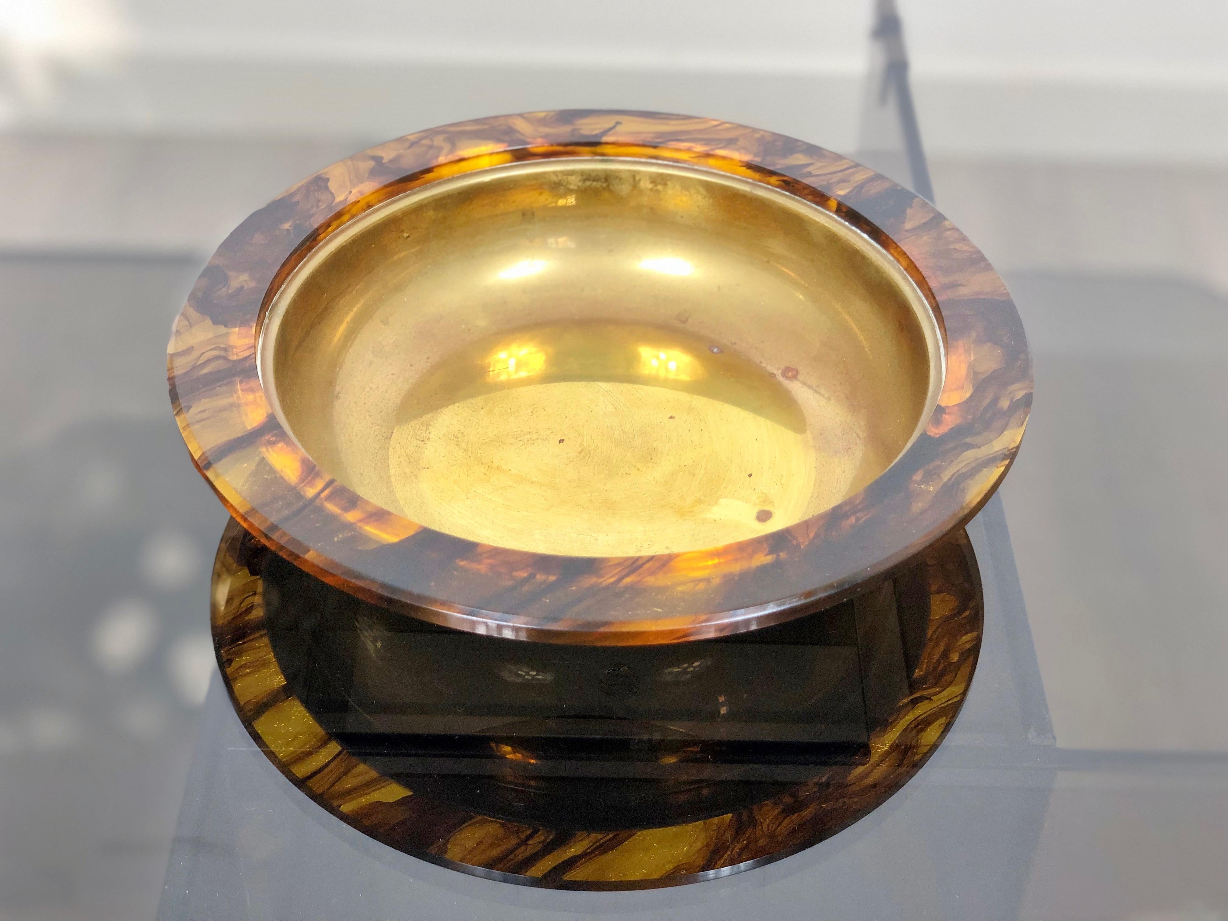 Centerpiece plate in faux tortoiseshell Lucite and brass interior, Italy, circa 1960.