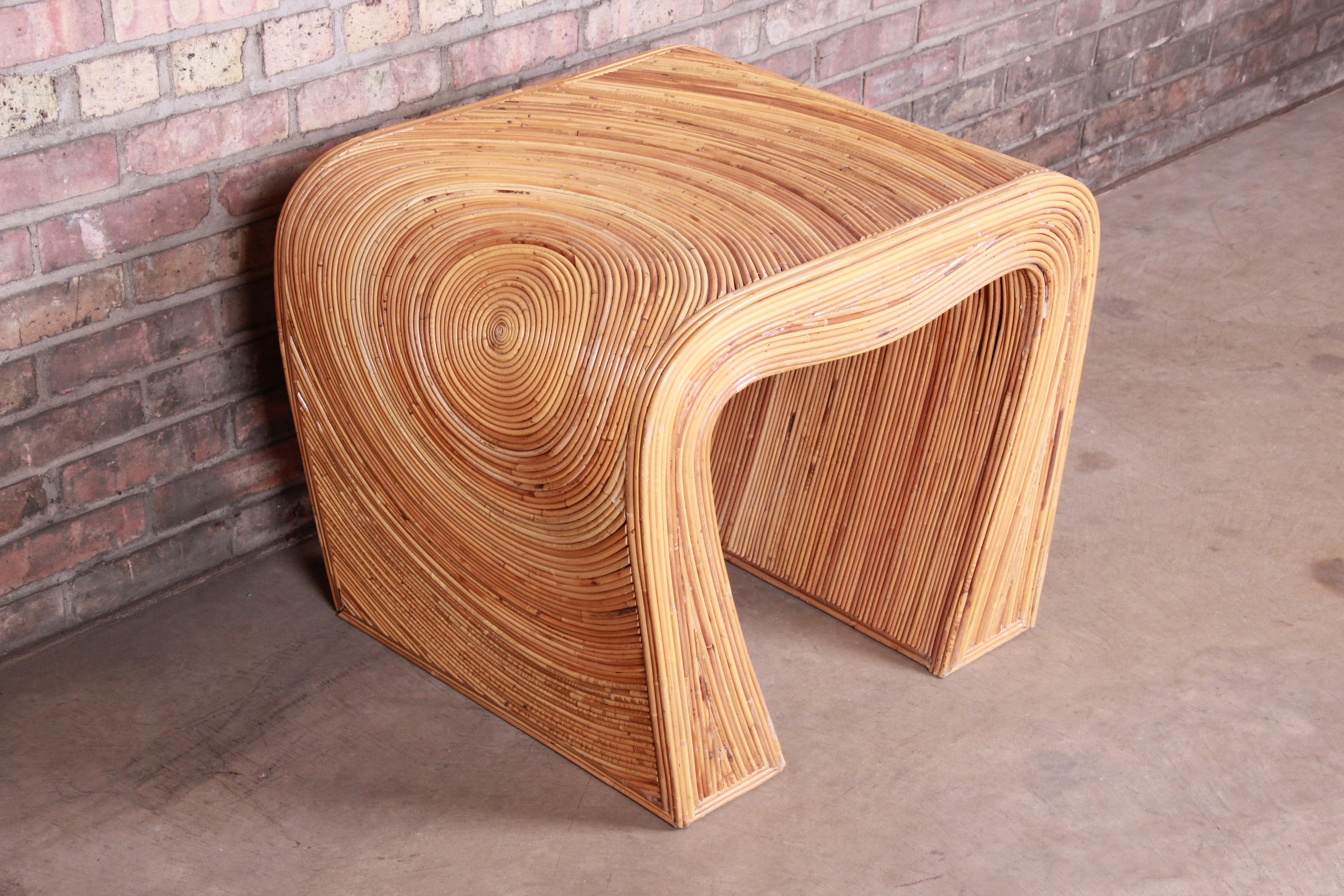 An exceptional midcentury Hollywood Regency split reed rattan side table

USA, circa 1970s

Measures: 26.25