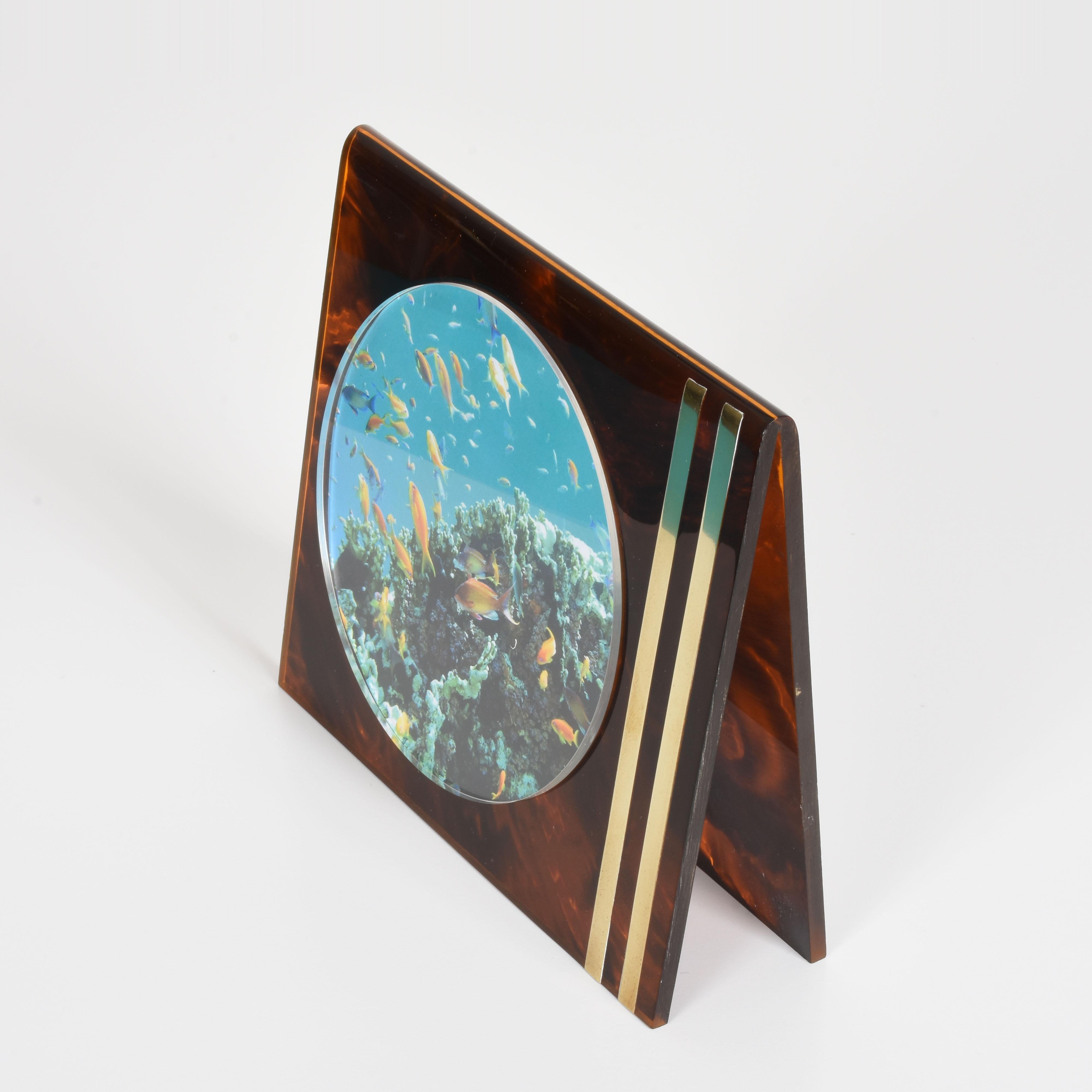 Attributable to Gabriella Crespi photo frame in Lucite tortoiseshell and brass, Italy, 1970s.