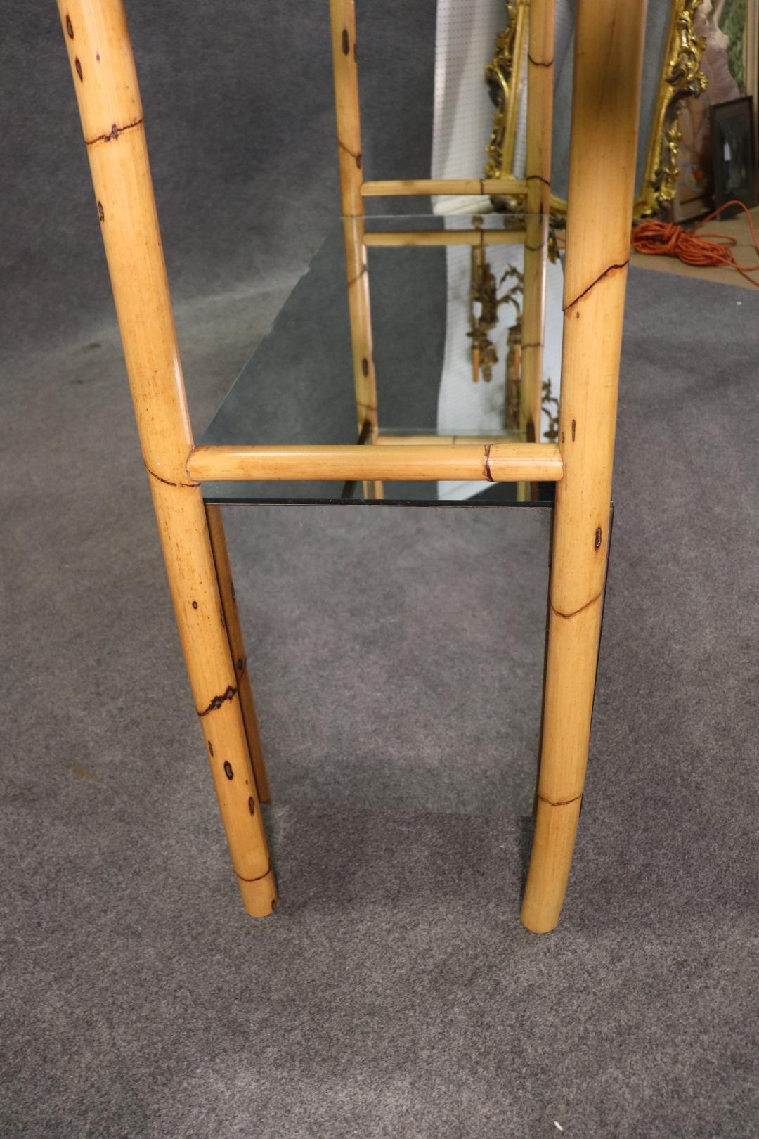 Mid Century Modern Rattan Brass Glass and MIrrored Etagere Display Shelf In Good Condition For Sale In Swedesboro, NJ