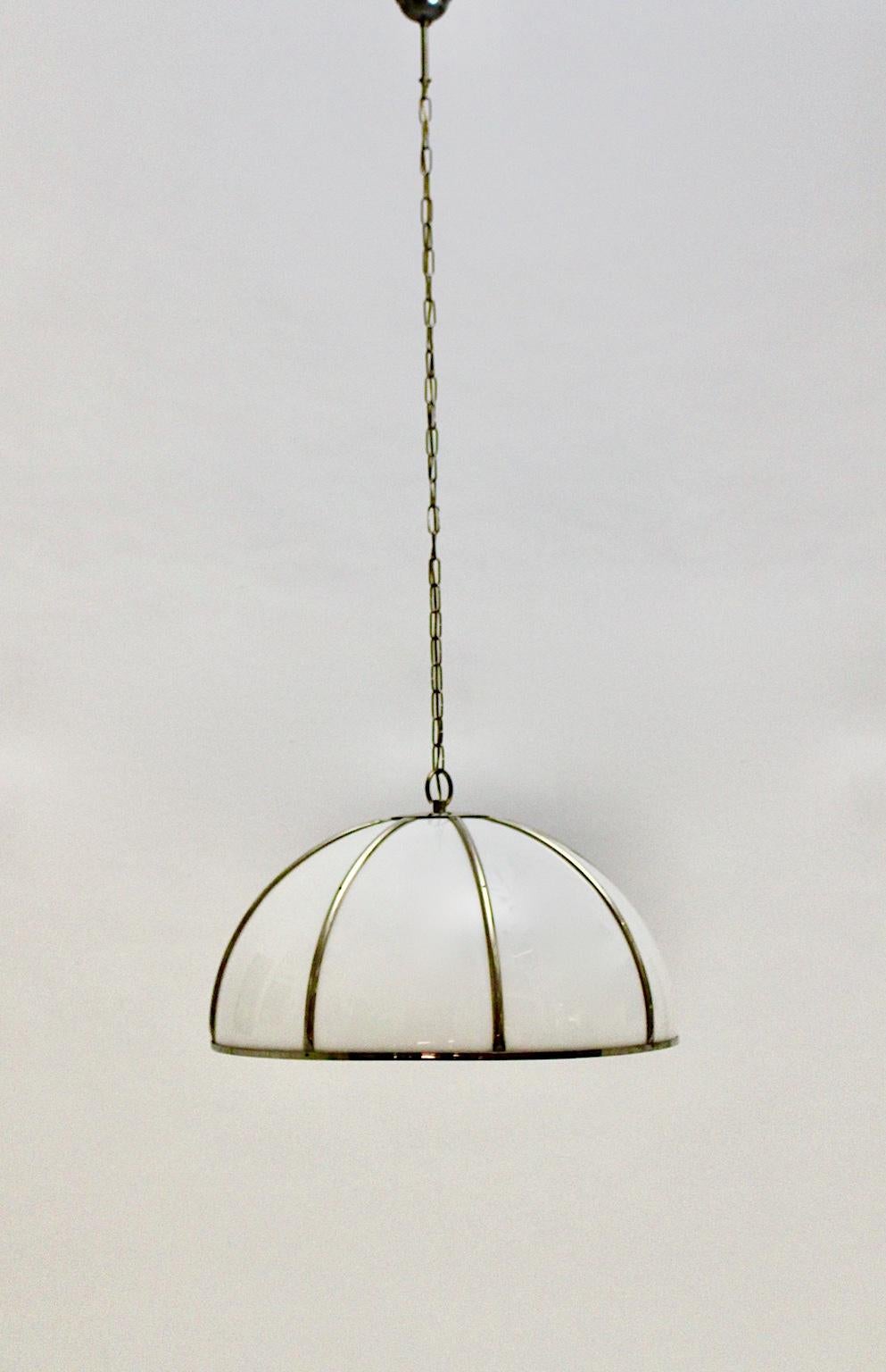 Gabriella Crespi vintage brass nickel plexiglass chandelier or pendant Fungo designed 1970s Italy.
Gabriella Crespi (1922-2017)
Gabriella Crespi presented her collections in Milan in the 1950s. Tiffany and Dior appreciated her glamorous design