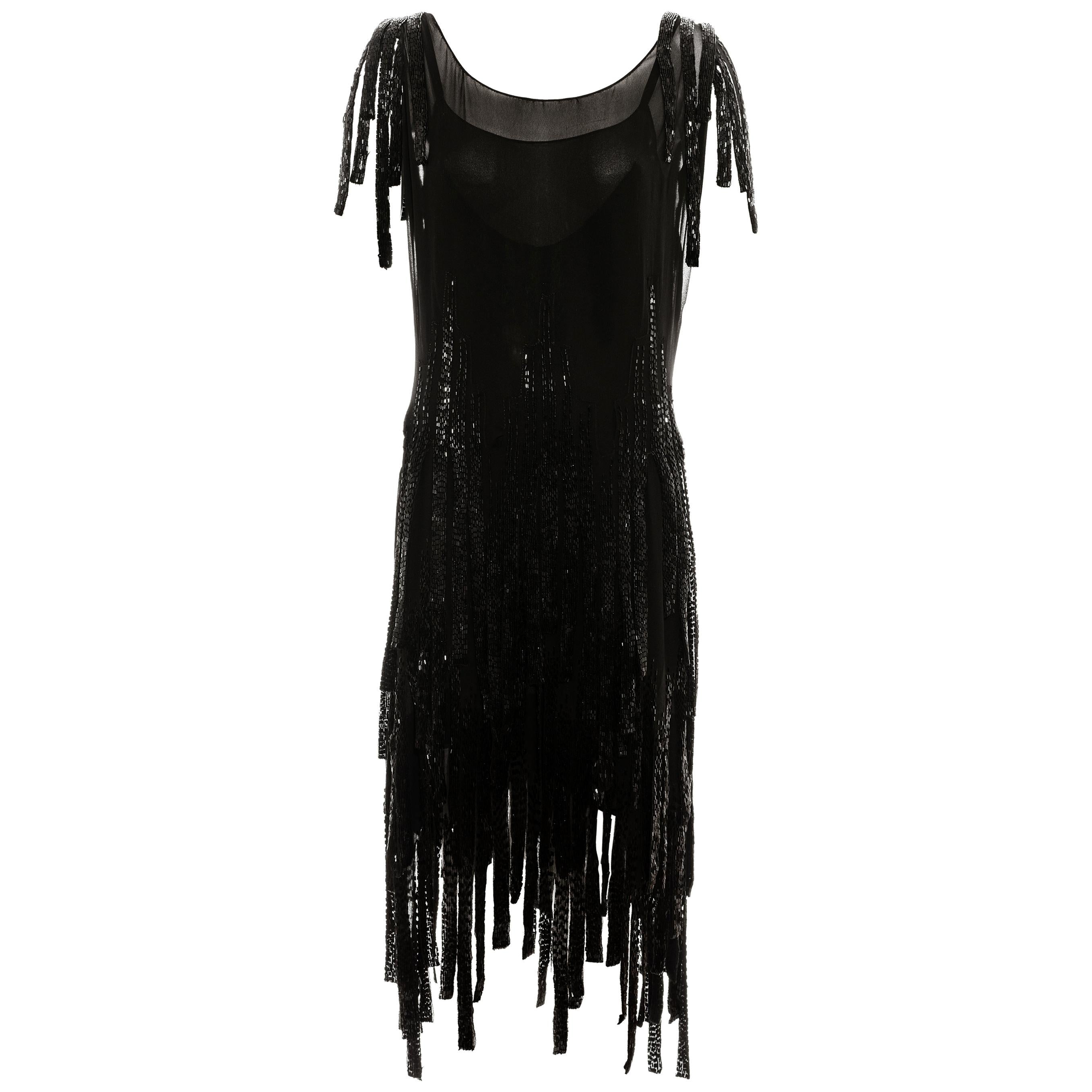 CHANEL - Timeless elegance — a dress in black silk chiffon