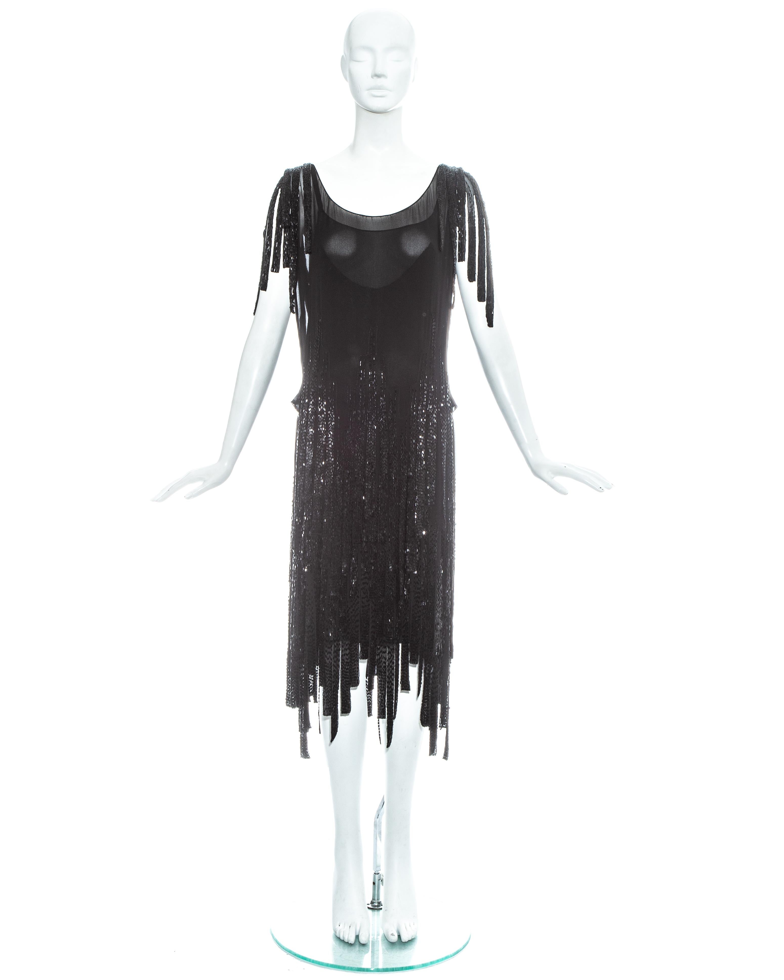 Gabrielle Chanel, Haute Couture beaded flapper dress 

- Glass beaded strands hang from the skirt and shoulders 
- One underdress and one overdress 
- Museum quality piece 

c. 1926

- Full condition report by request 