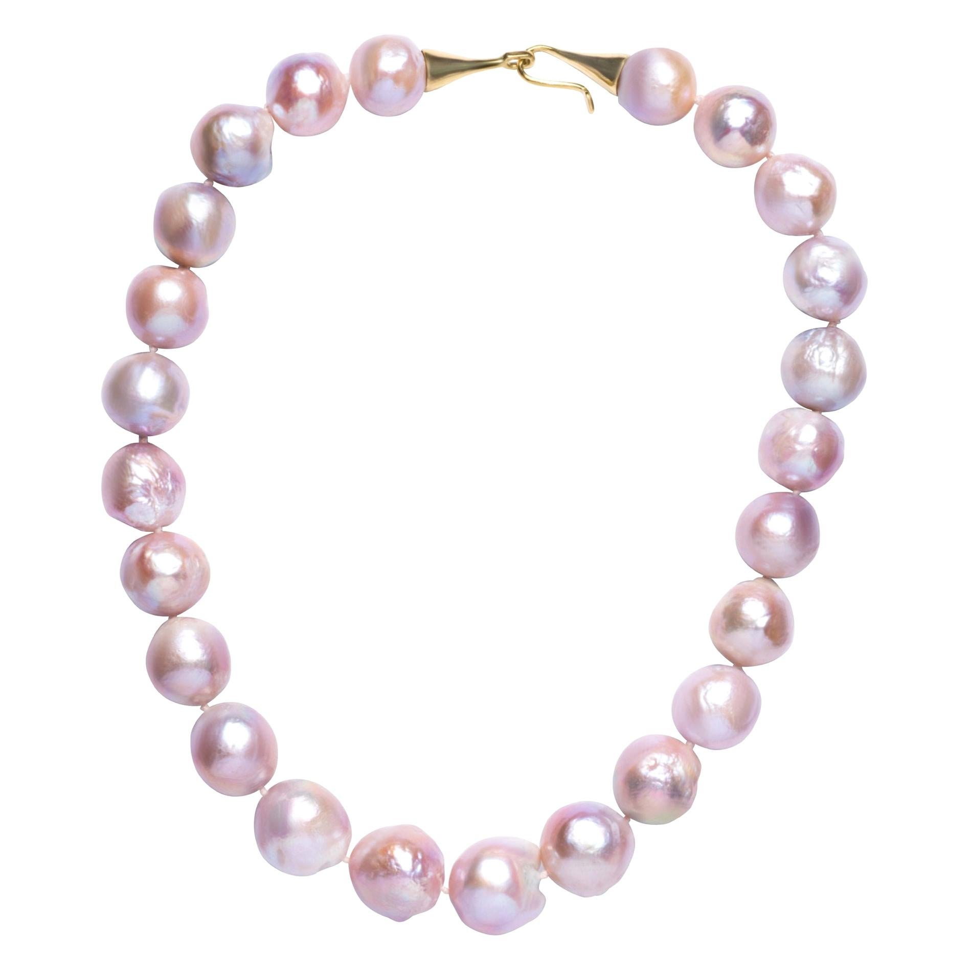 Gabrielle Sanchez, Graduating Pale Pink and Lavender Freshwater Baroque Pearls