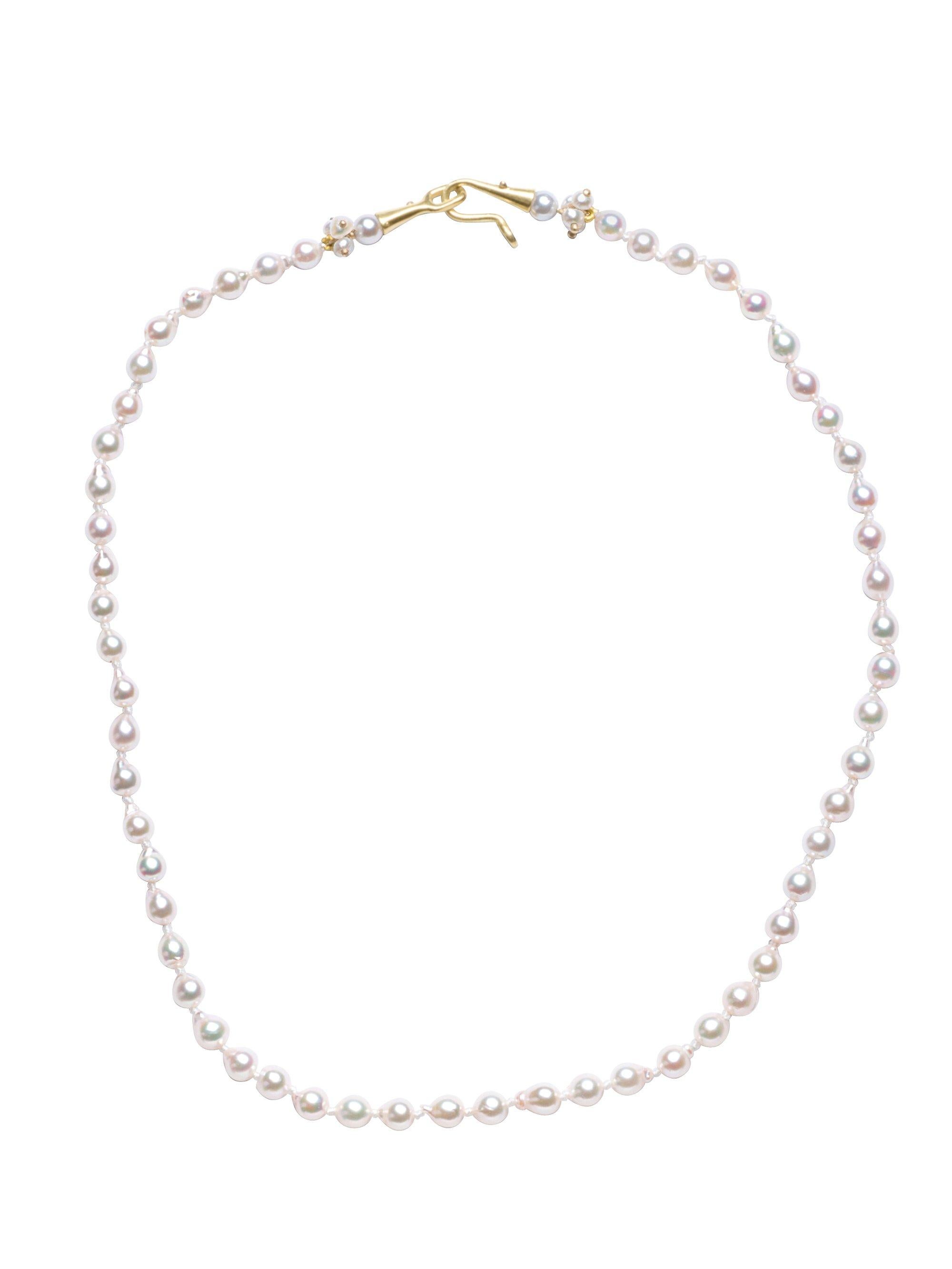 4-5mm super lustrous white Japanese baby baroque pearls on Gabrielle's signature 18k baby cone hook & eye 16”