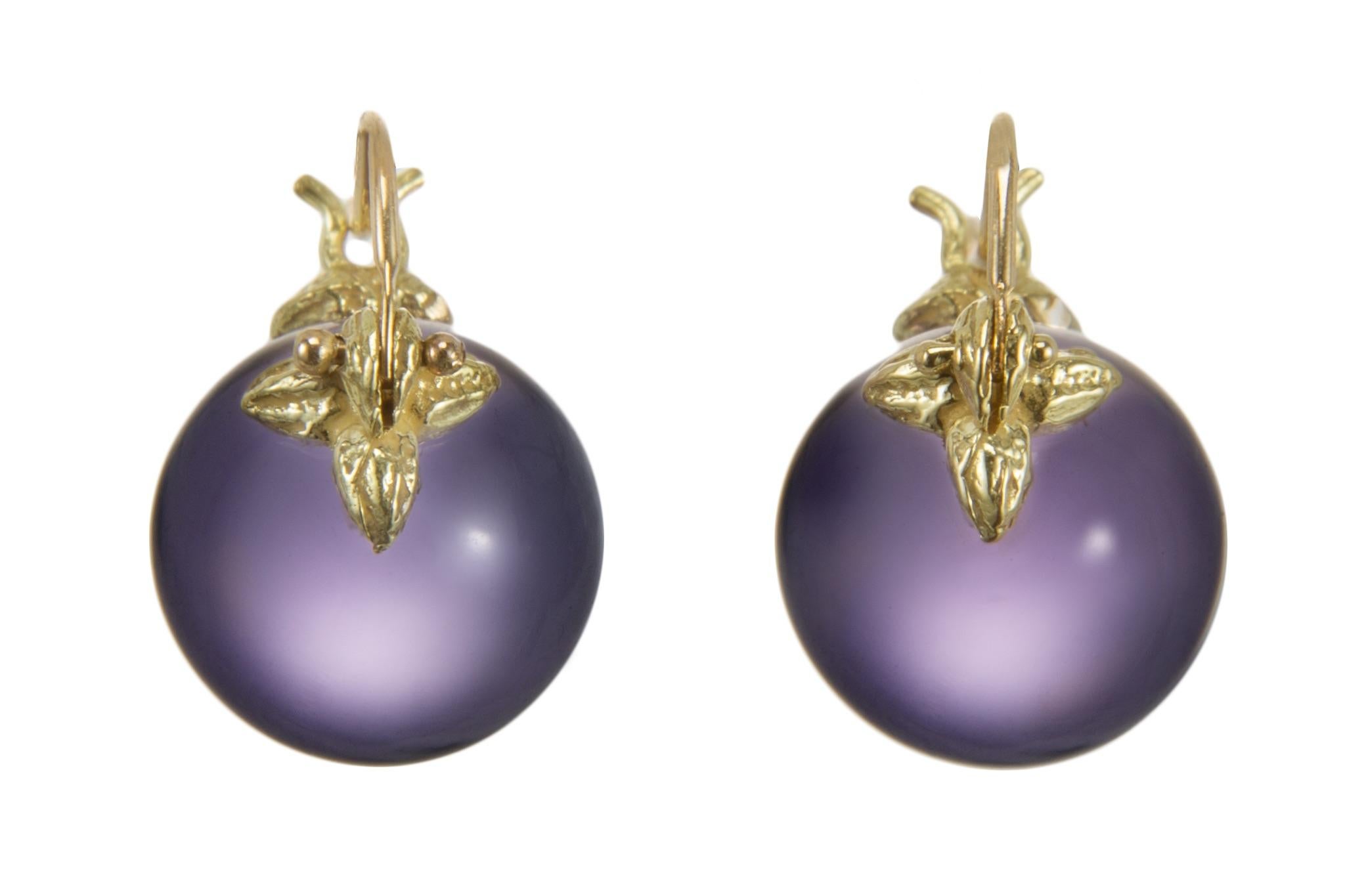 Smooth orbs of purple amethyst sit regally beneath Gabrielle’s signature 18karet flyer setting creating an earring to wear for all of those special occasions.