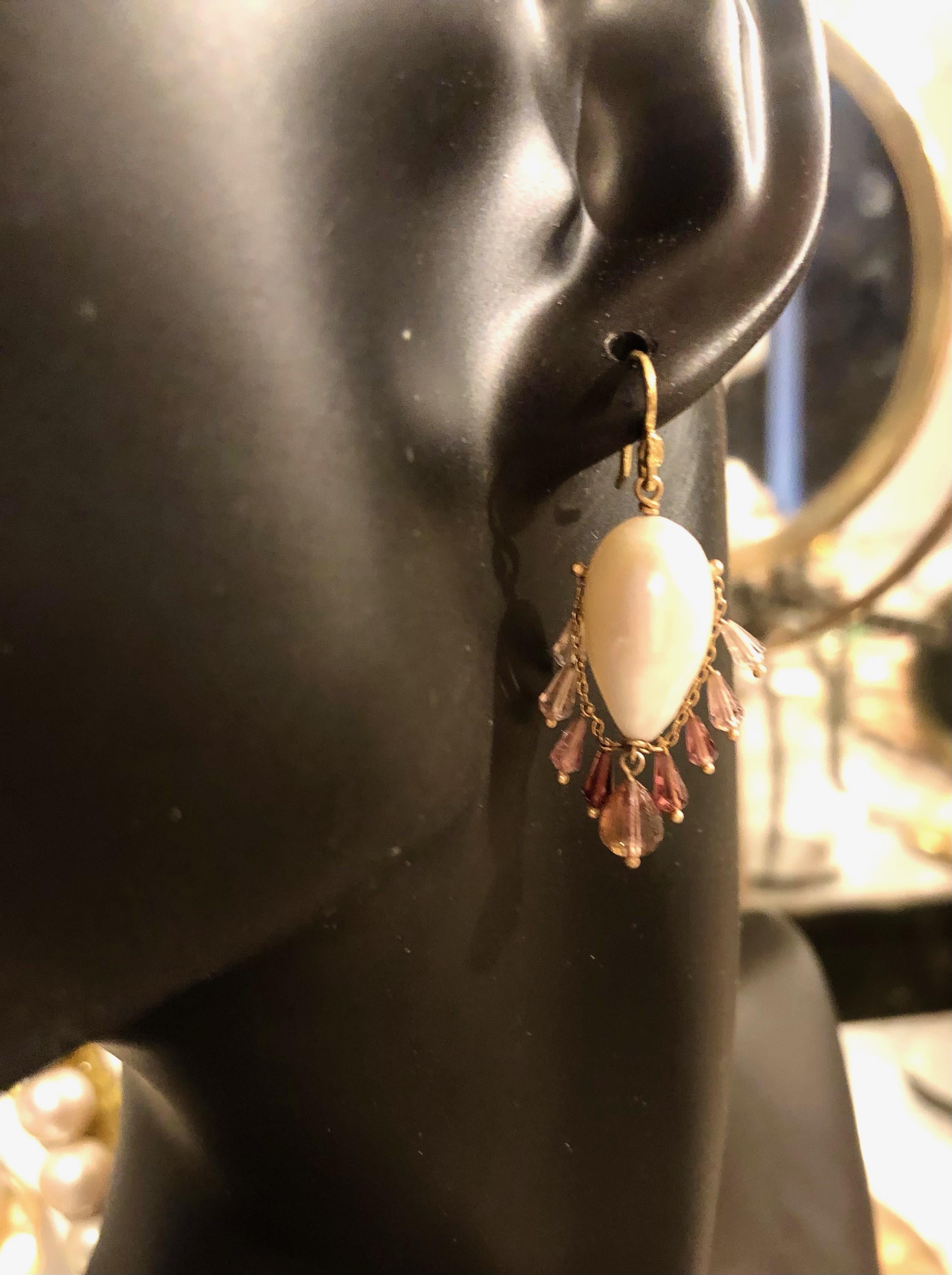 Gabrielle manages to gild a lily -- in this case, two flawless white South Sea pearl drops -- by hanging a pink ombre fringe of juicy pink tourmaline beneath them. Playful and lovely! Suspended from 18k single seed earwires.
White South Sea teardrop
