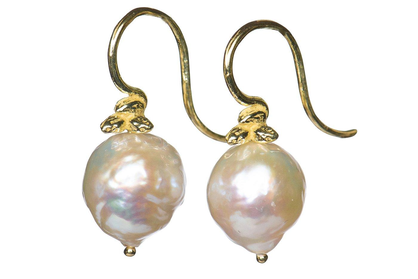 Classic luxury for every day, 11-12mm white baroque freshwater pearls hung from Gabrielle's 18k triple-seed earwires.