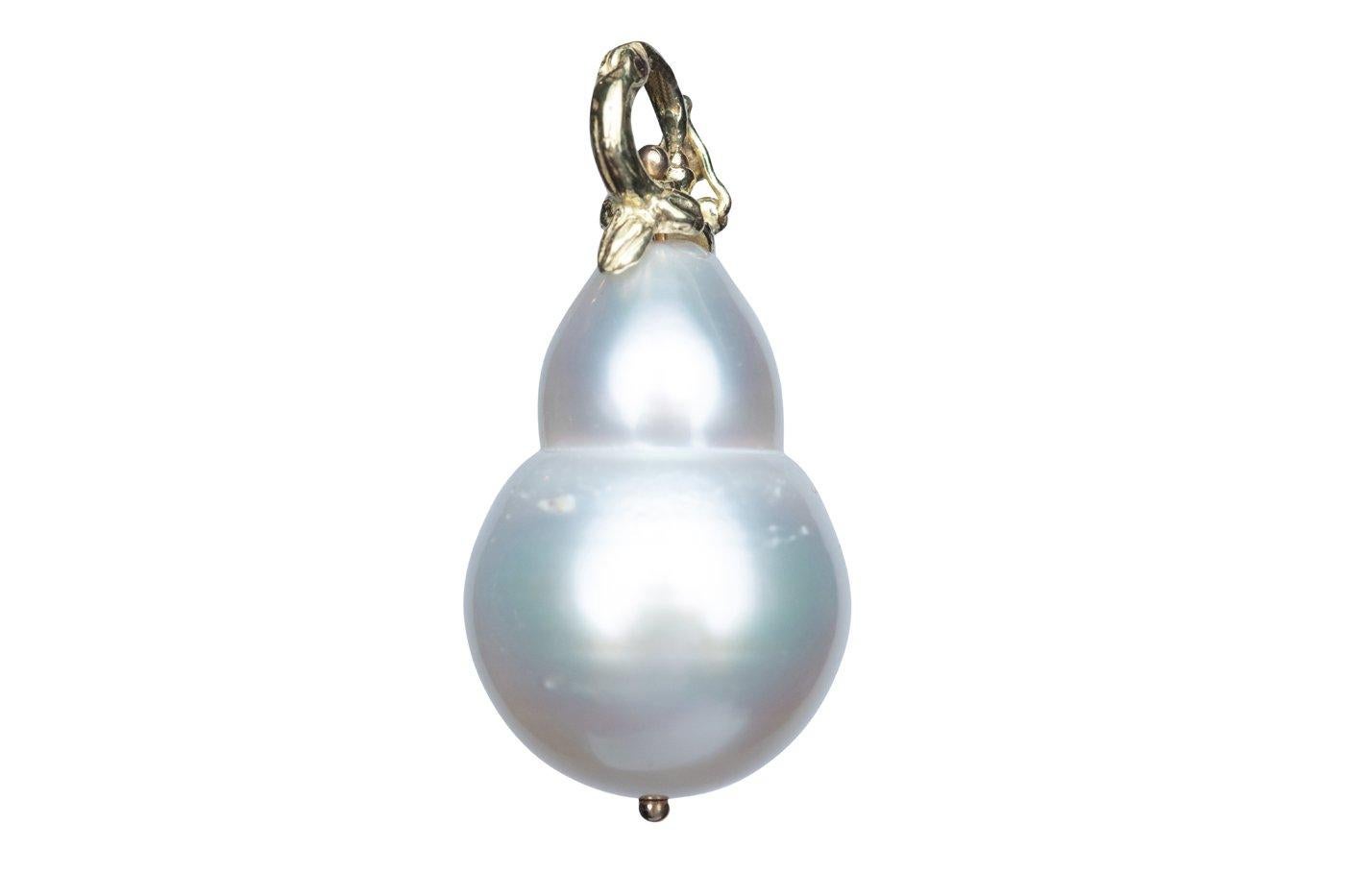 Nature shows off with this extra-large double-drop white South Sea pearl enhancer pendant, held by an 18k multi-seed locking clasp (enhancer).  Pearl 21.5mmx16mm. Pearl enhancer only!