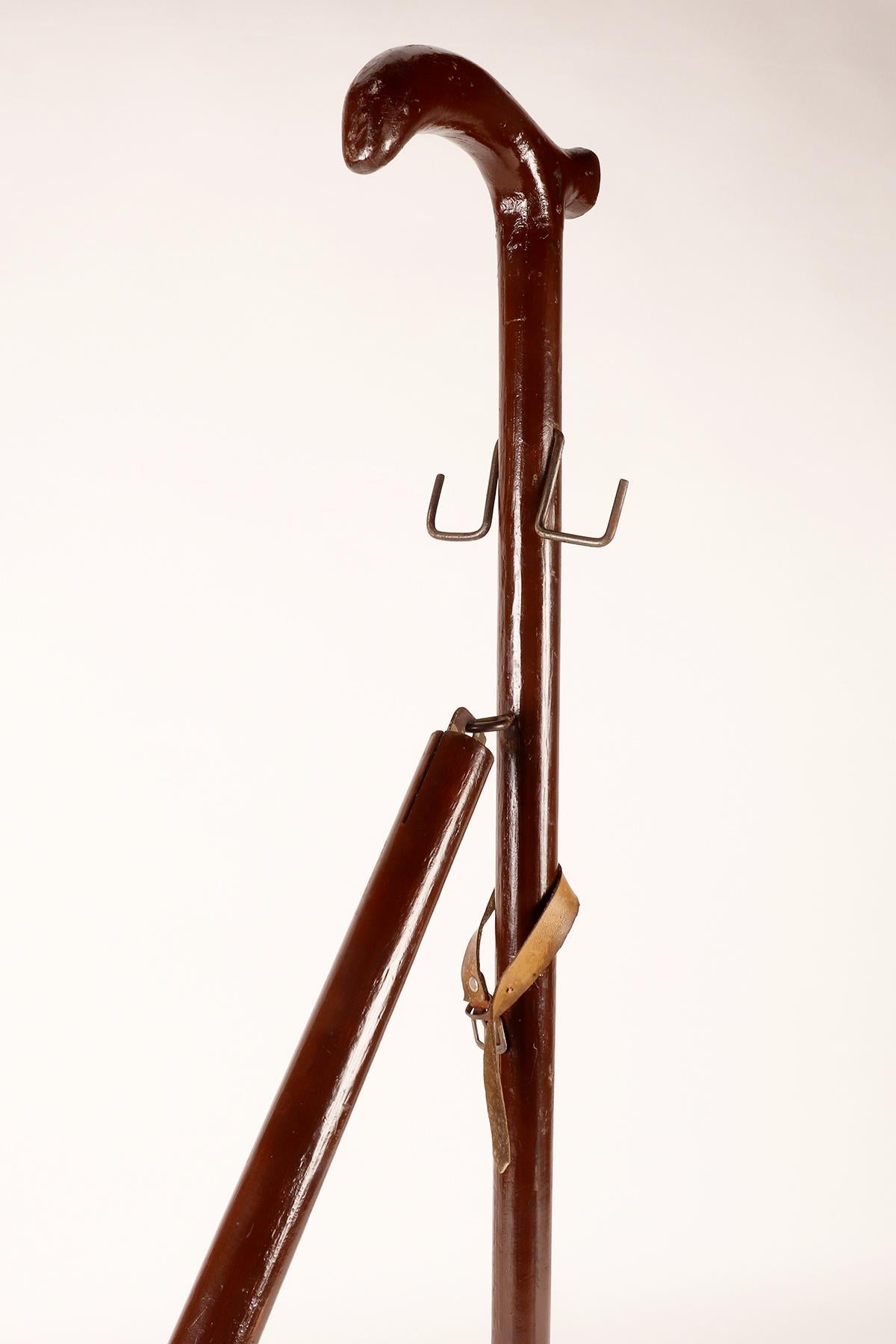 Iron Gadget-system walking stick with bag holder function, Germany, 1920s. For Sale