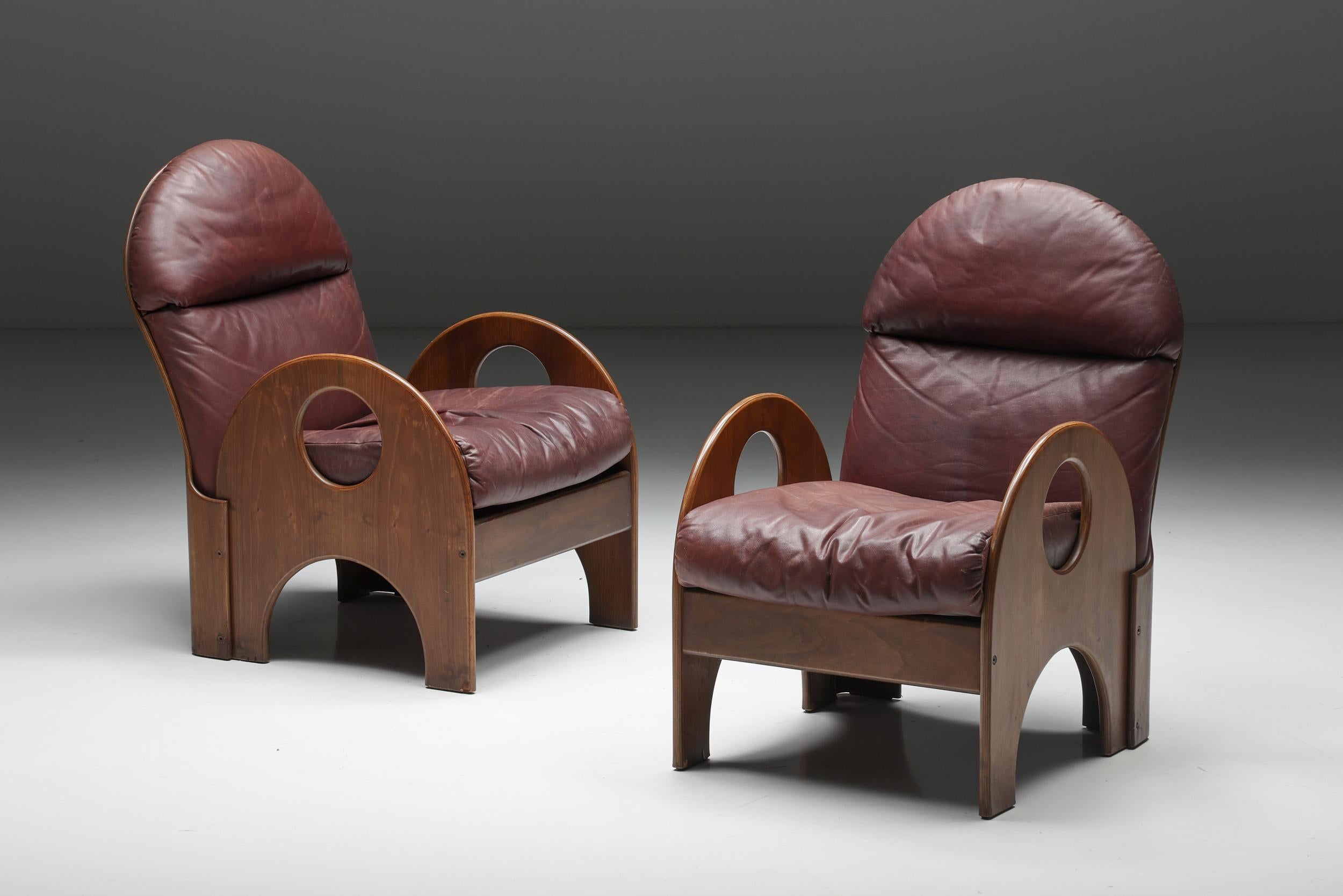 Gae Aulenti; Easy Chairs; Armchairs; Arcata; Poltronova; Italian Design; Italy; 1968; Walnut; Burgundy Leather; Mid-Century Modern; 

Gae Aulenti Arcata Easy Chair in Walnut and Burgundy Leather, 1960s

'Arcata' easy chairs, designed by Gae