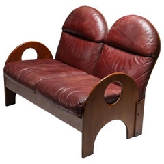 Gae Aulenti "Arcata" Love Seat in Walnut and Burgundy Leather, 1968