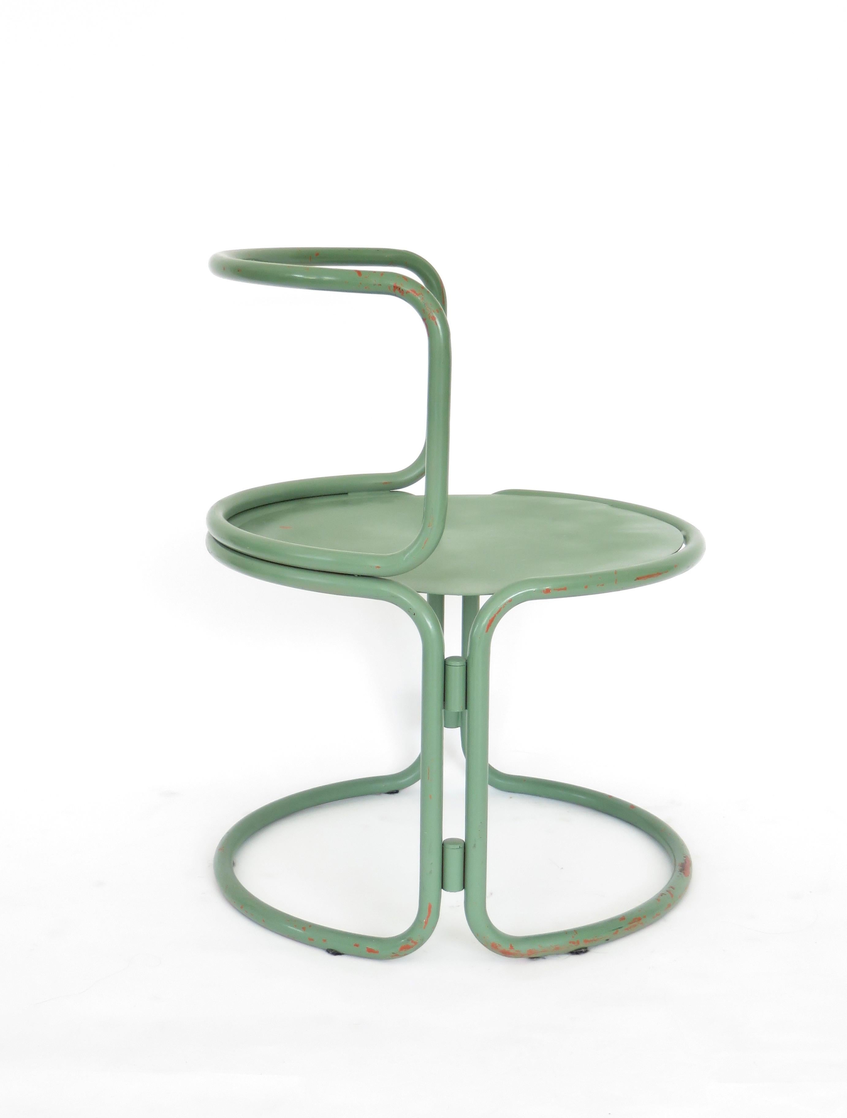 Tubular metal painted green side chair attributed to the Italian architect Gae Aulenti in the style of or a variation of the Locus Solus Chair. Traces of orange paint under the green paint. 
Originally designed in 1963.
Overall size: 21.75