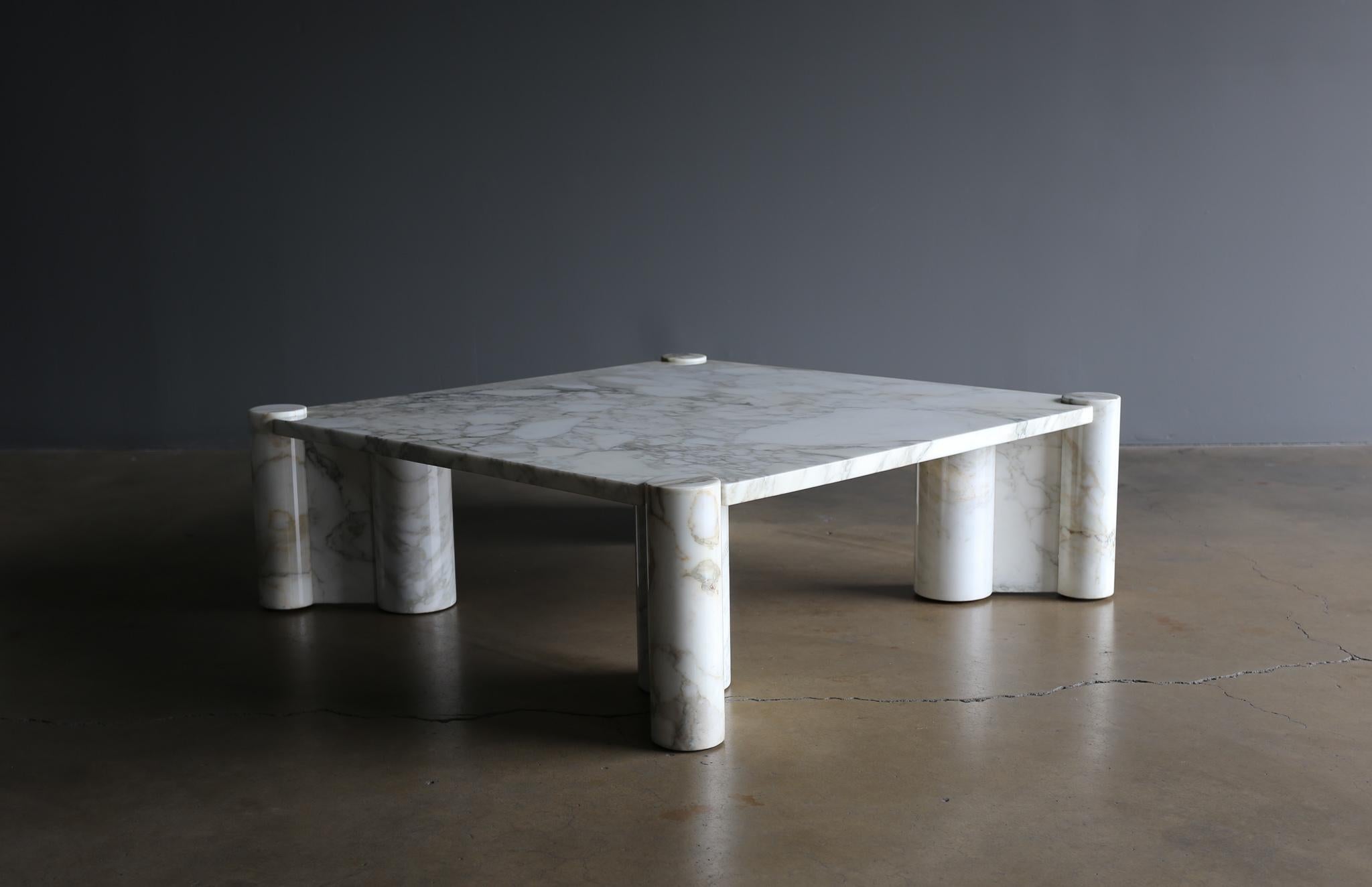 Gae Aulenti Calacatta marble jumbo table. Cylindrical marble legs with dynamic veining. Manufactured by Knoll International, circa 1970.