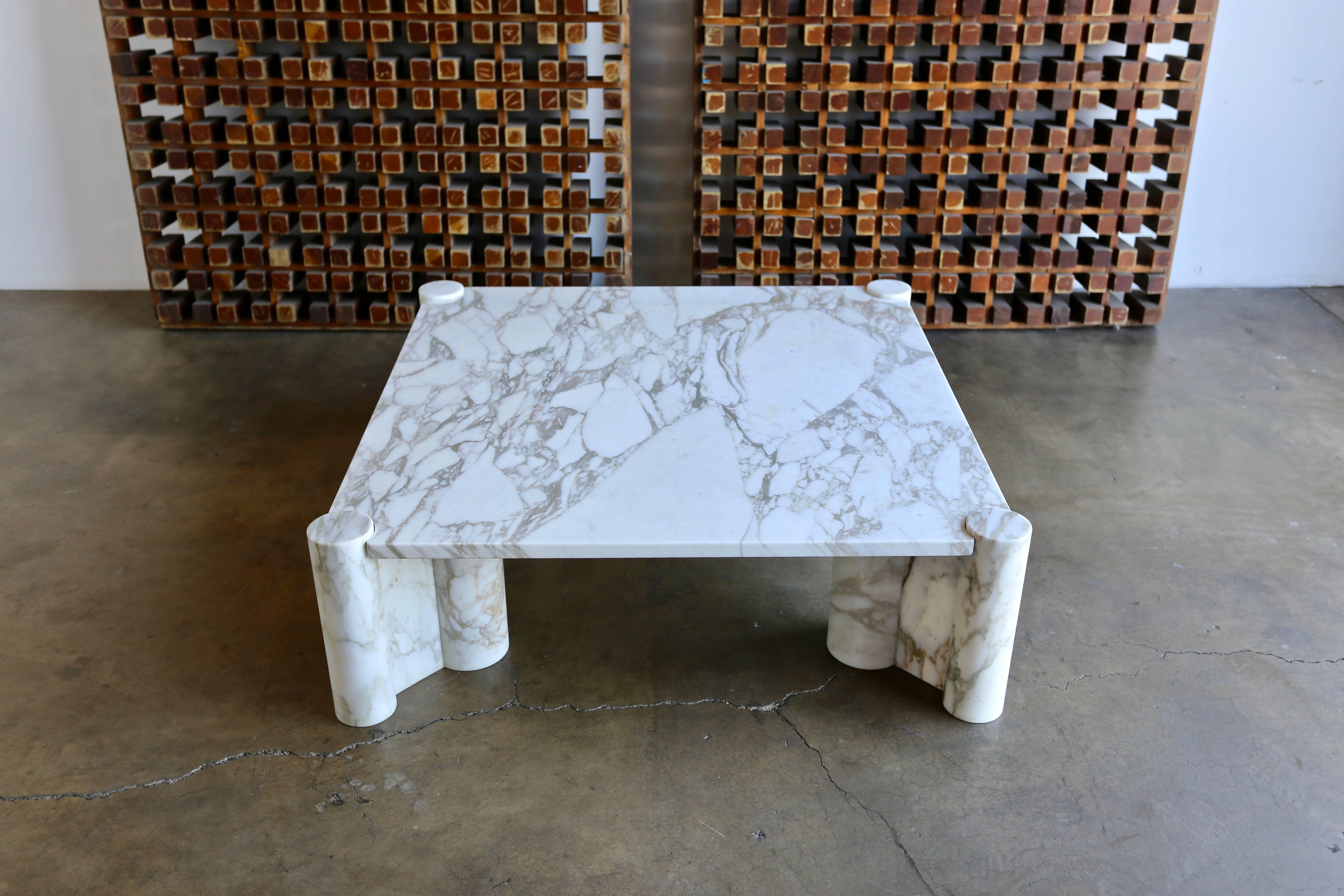 Gae Aulenti Calacatta marble jumbo table. Cylindrical marble legs with dynamic veining. Manufactured by Knoll, circa 1970.