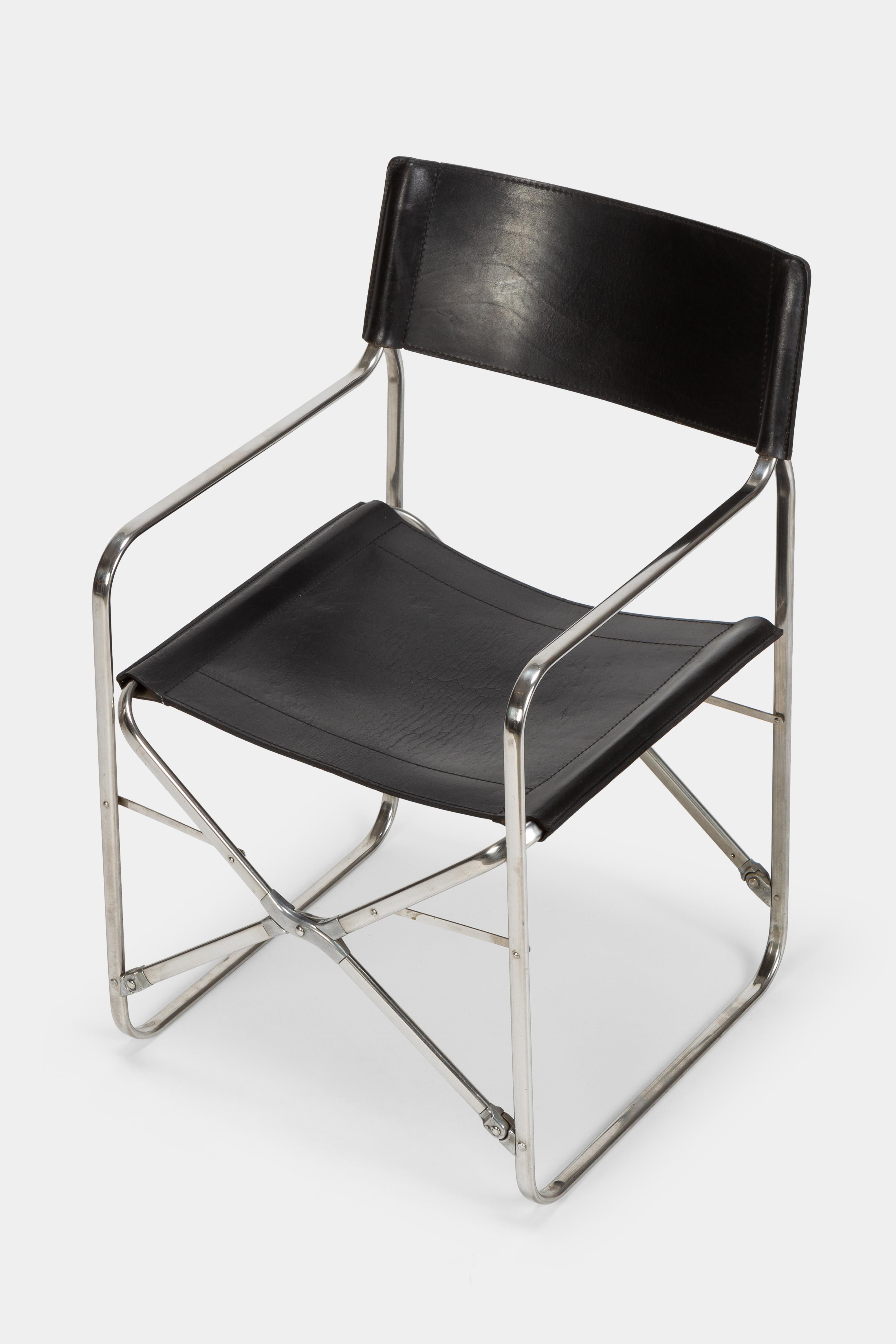 Gae Aulenti folding chair April 2120 manufactured by Zanotta in the 1960s in Italy. Fine black leather attached to a chrome steel frame.