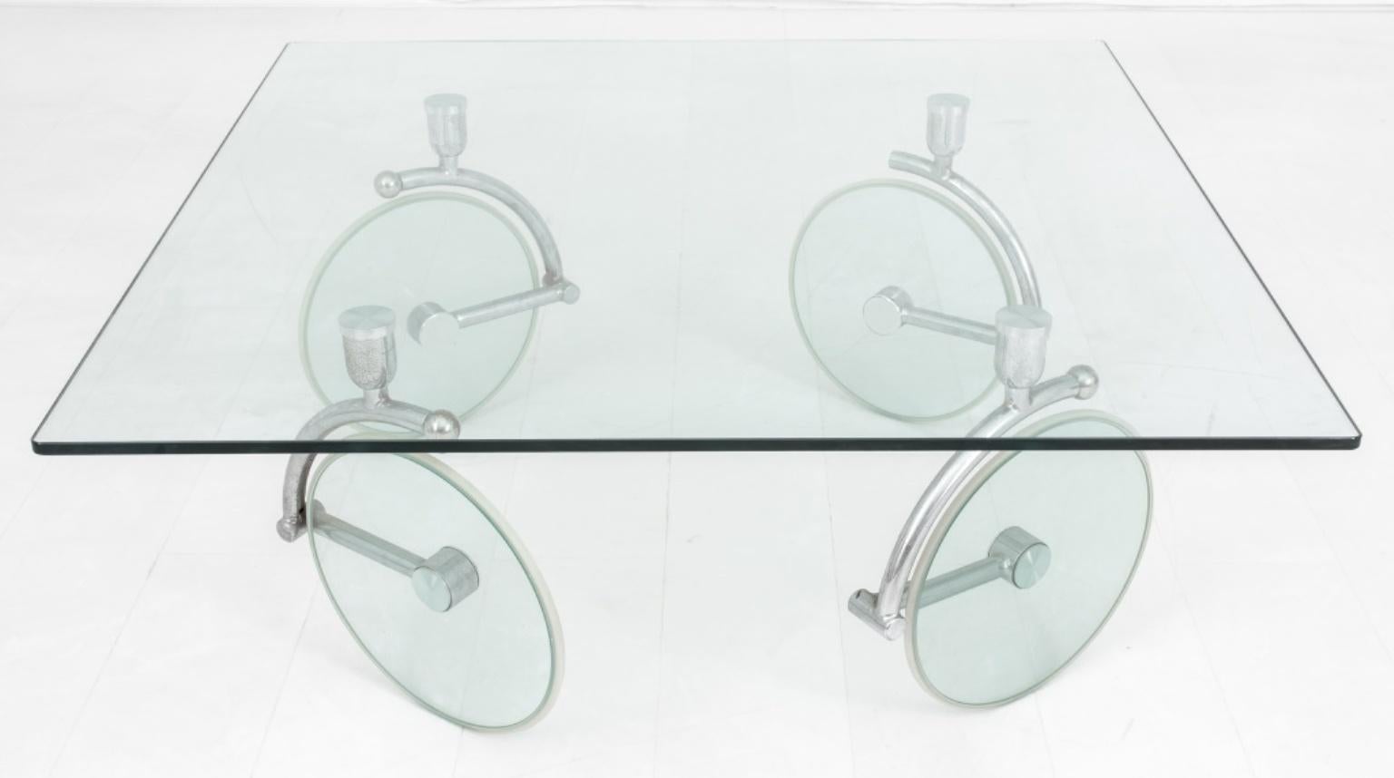 Gae Aulenti (Italian, 1927 - 2012) for Fontana Arte Postmodern design 'Bicycle Tour' coffee table, square glass top on four metal mount wheels, circa 1980.

Dimensions: 18