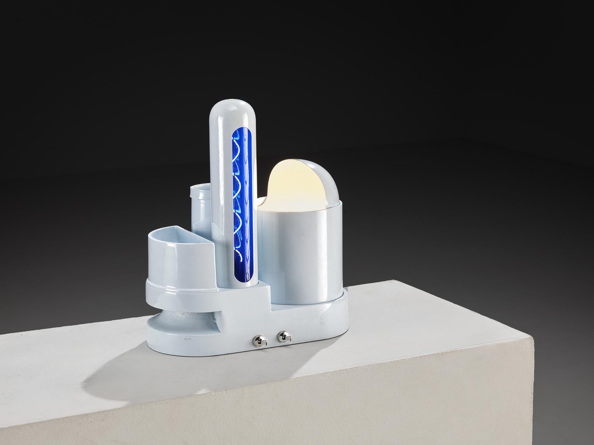 Gae Aulenti for Candle, multifunctional 'Rimorchiatore' table lamp, enamelled metal, Italy, 1969

This sculptural table lamp was designed by the visionary Italian architect and designer Gae Aulenti in 1969. Crafted from light blue enamelled metal,