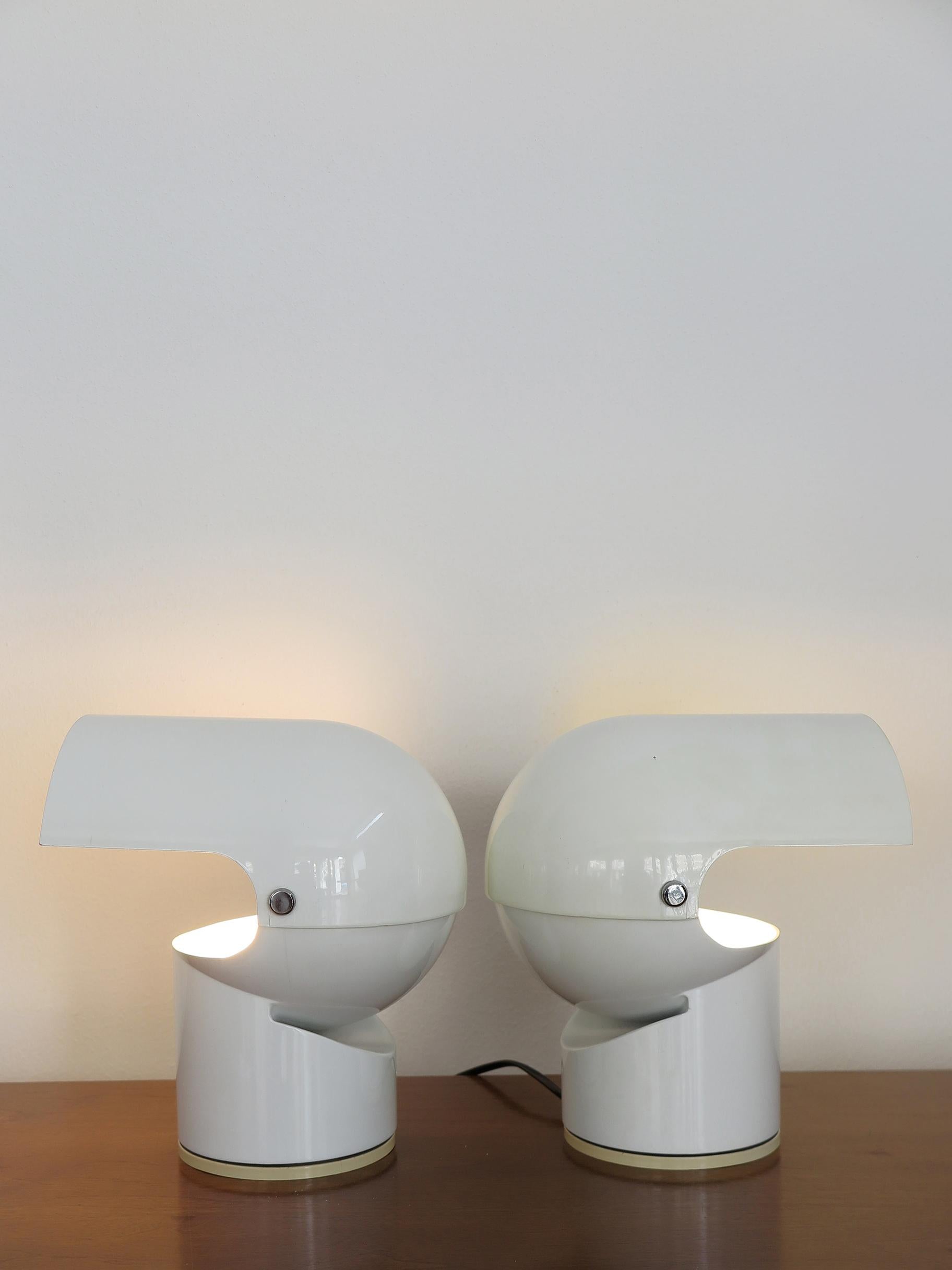 Italian midcentury modern design set of two table lamps “Pileino” model designed by Gae Aulenti and produced by Artemide from 1970s. White lacquered metal frame with adjustable diffuser, brand and model on the base, Italy 1970s.

Please note that