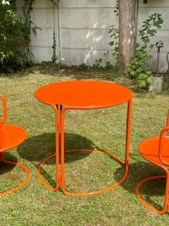 Gae Aulenti, orange lacquered garden table