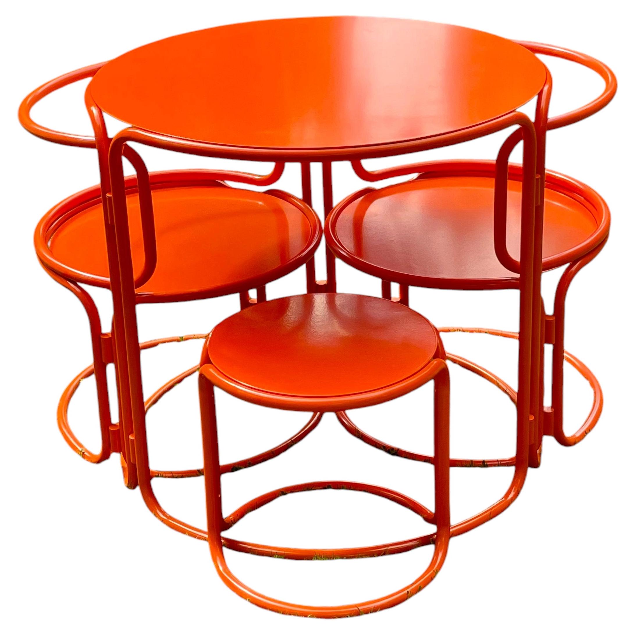 Gae Aulenti, orange lacquered garden table