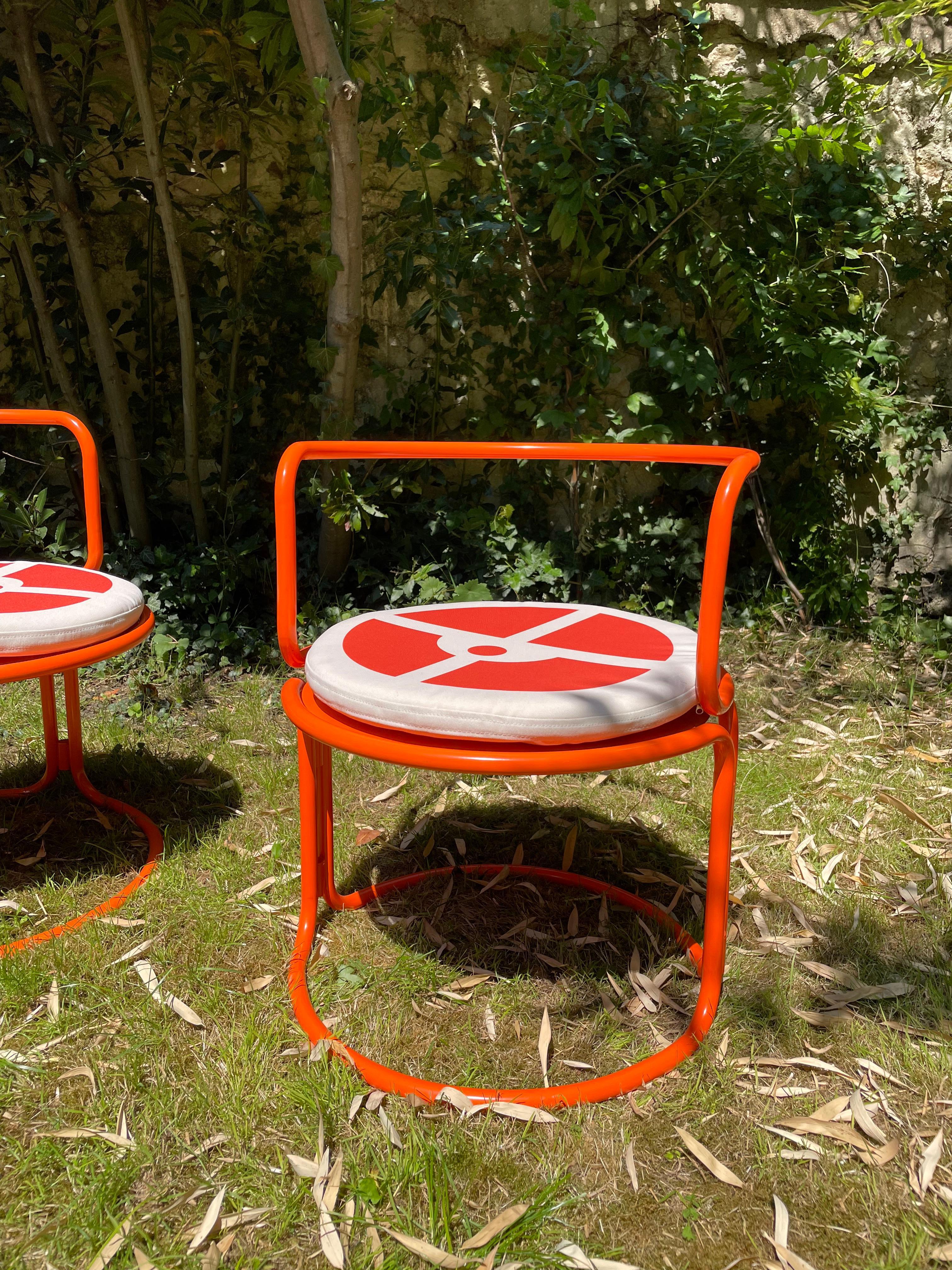 Mid-20th Century Gae Aulenti, orange lacquered steel armchairs For Sale