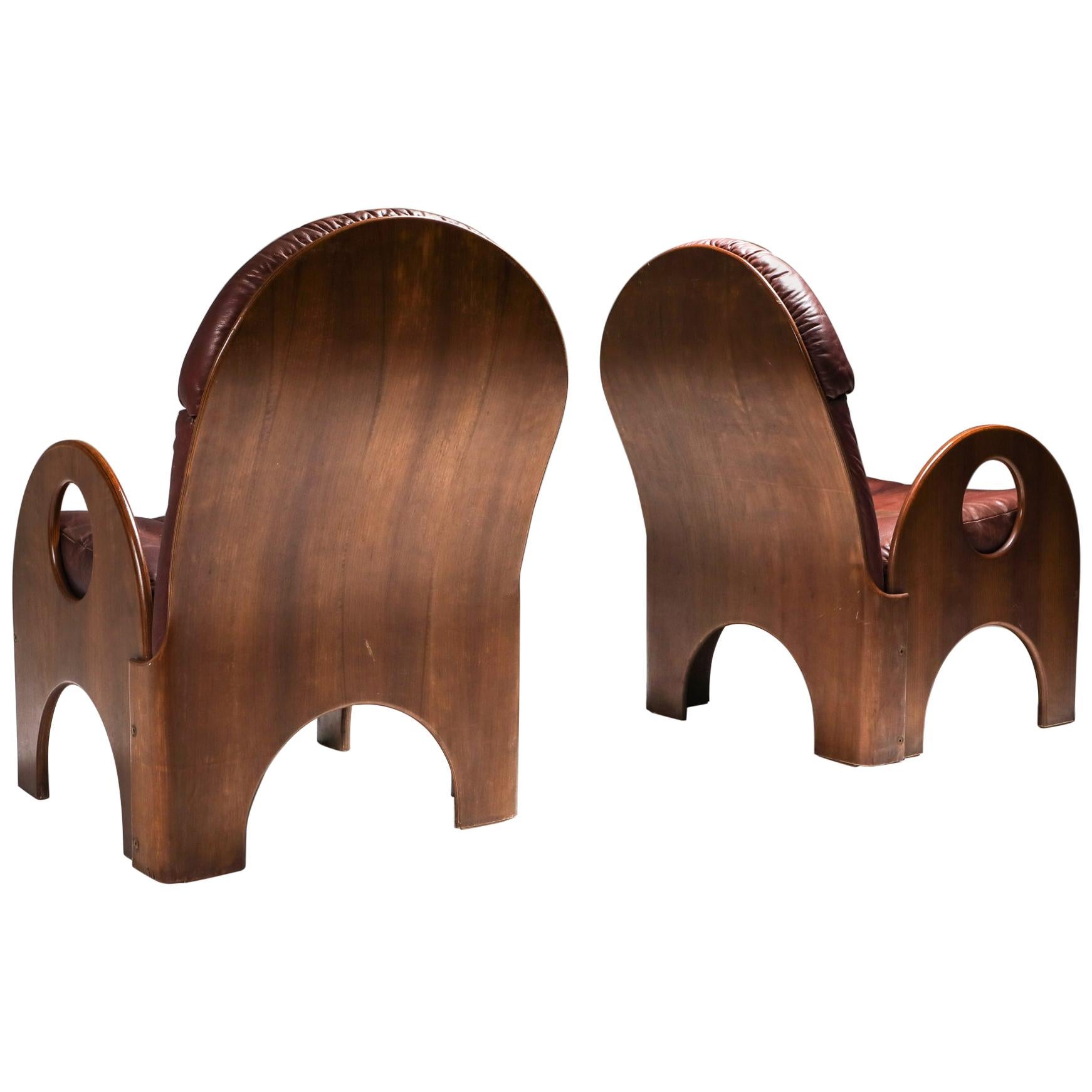 Gae Aulenti Pair of "Arcata" Easy Chairs in Walnut and Burgundy Leather