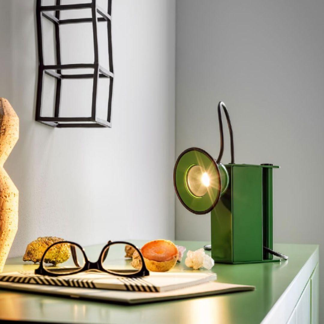 Gae Aulenti & Piero Castiglioni 'Minibox' table lamp in green for Stilnovo

Founded in 1946 in Milan, Stilnovo was one of the most innovative lighting companies in Italy during the Midcentury era, producing iconic pieces by such luminaries as Joe