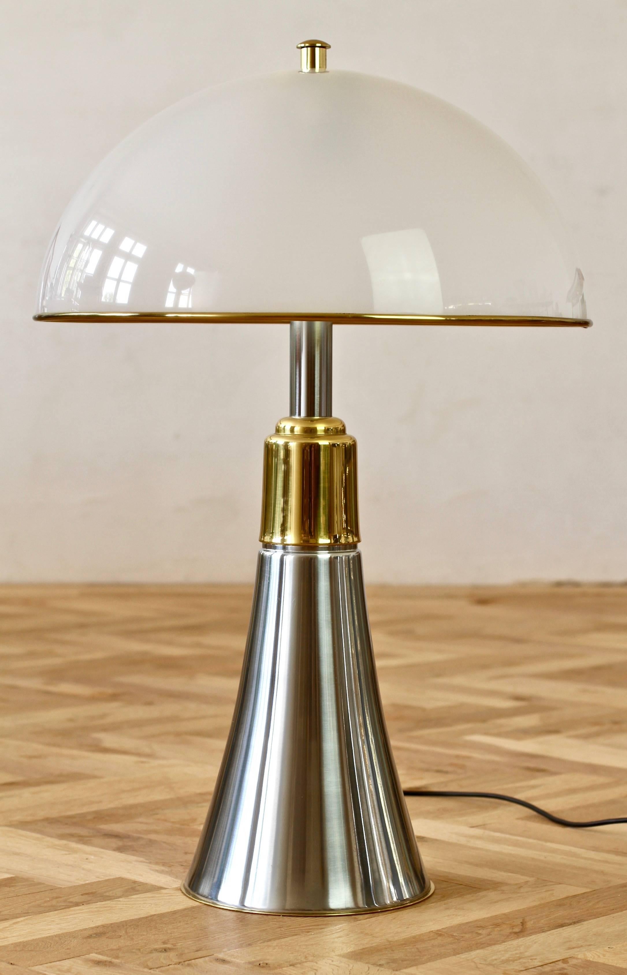 Mid-Century Modern Gae Aulenti style oversized table or floor lamp made, circa 1970s in Italy or Belgium. Featuring brushed aluminium and polished brass, this piece lends itself to any modern home decor as well as the Mid-Century Modern, Hollywood