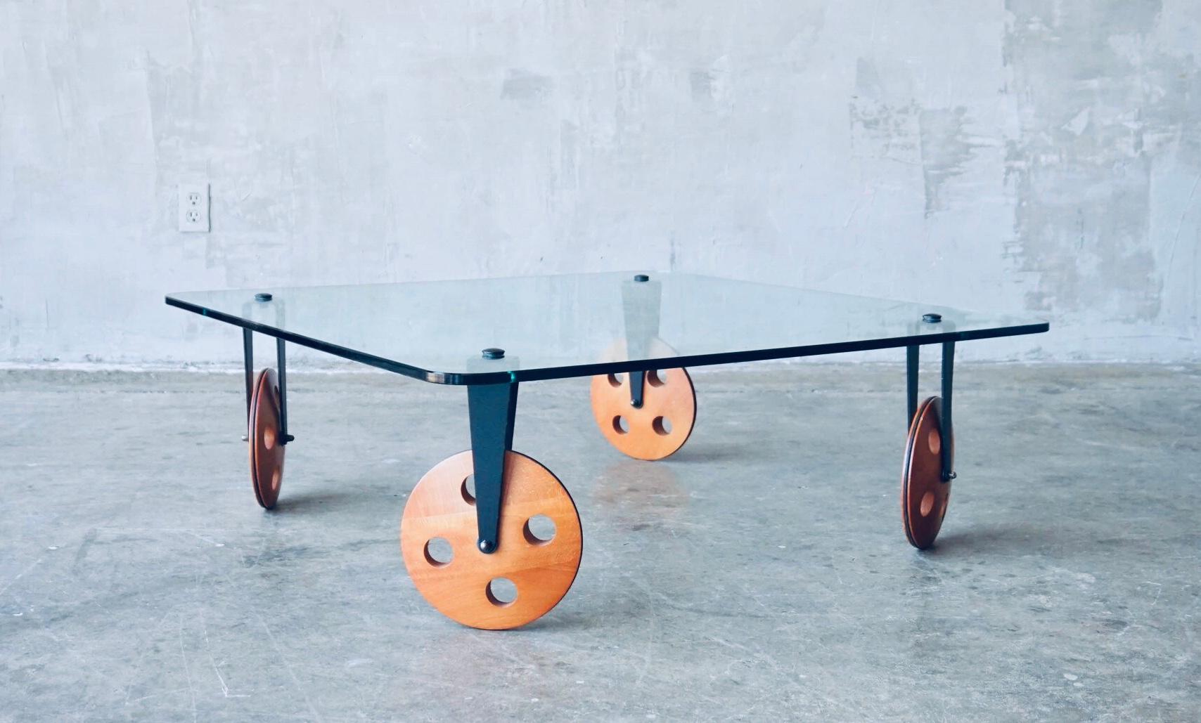 Gae Aulenti Postmodern Industrial insp Coffee Table lWood Wheels Fontana Arte In Good Condition For Sale In St.Petersburg, FL