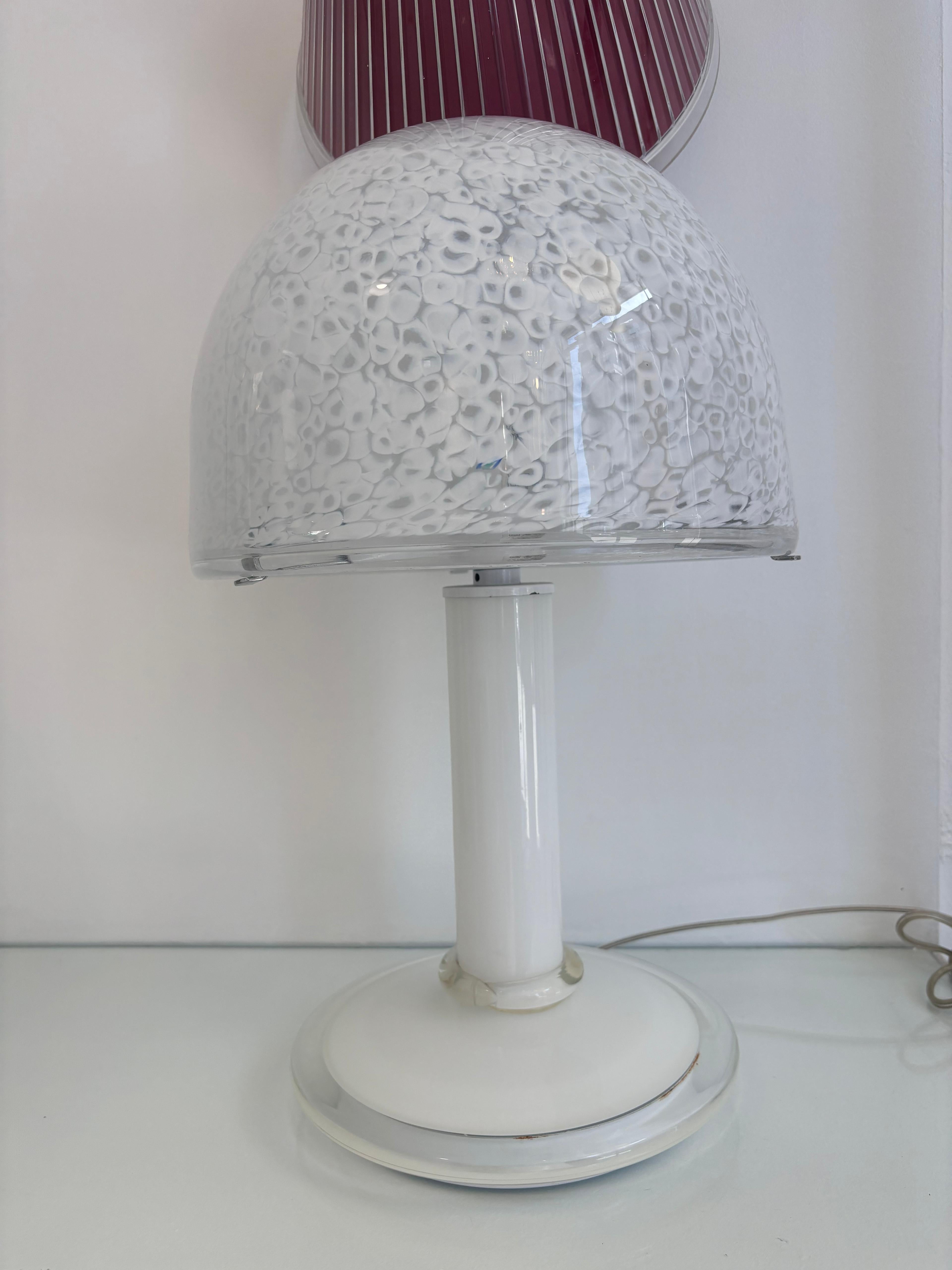 Gae Aulenti Vistosi Neverrino Murano's Glass Chandelier 1970's

Murano Glass frame, item in good conservative condition, no structural defects to report. (see photo)

Height 43cm
Diameter 26 cm