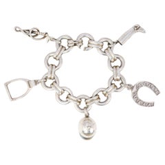 Gaétan de Percin (att. to HERMES) Silver bracelet and equestrian charms