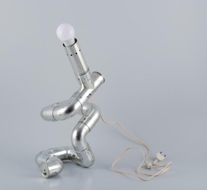 Gaetano Missaglia, Italian designer. Rombo table lamp composed of pipes. In Good Condition For Sale In Copenhagen, DK