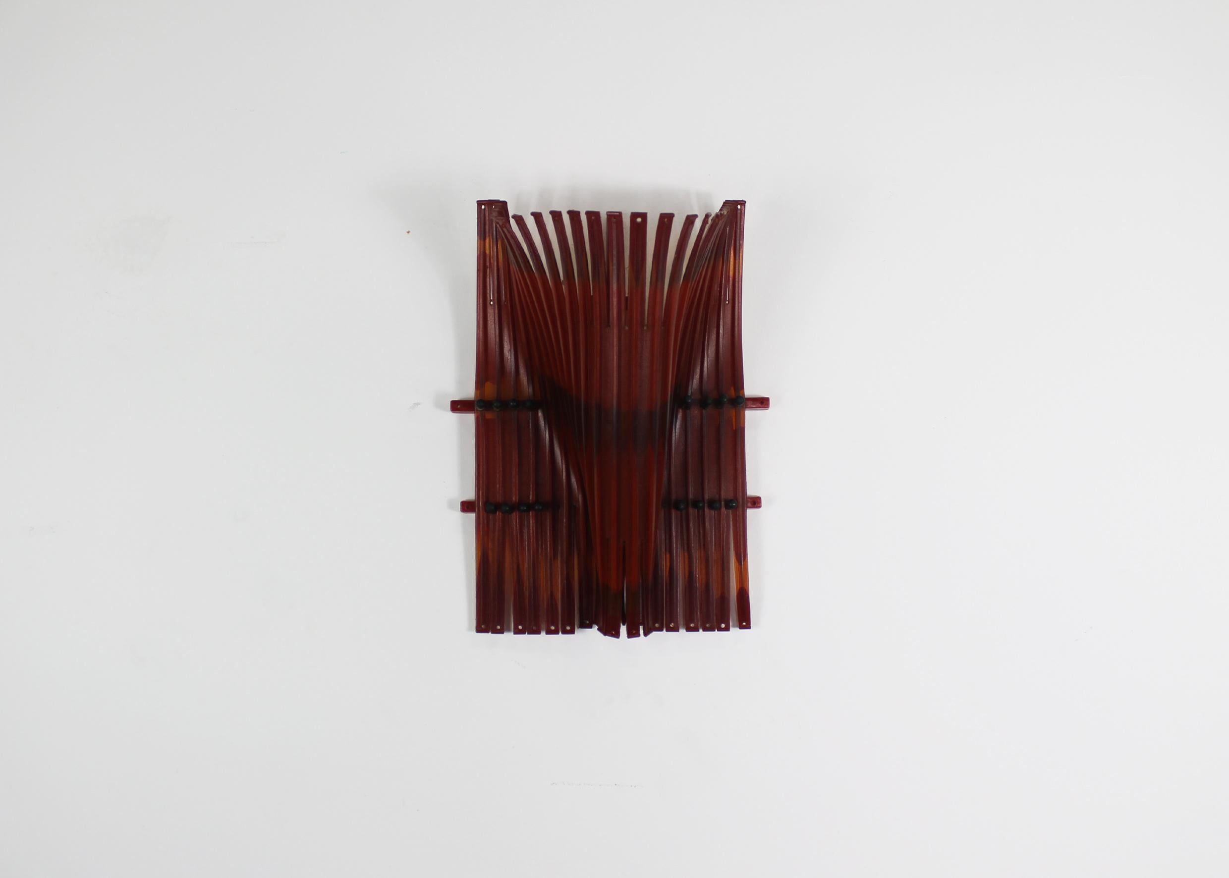 Alda wall lamp in rubber and steel rod, designed by Gaetano Pesce and realized in 2004. 

The lamp has a US plug (type A)

Gaetano Pesce is a prominent contemporary Italian designer and architect known for his bold experimentation with materials and