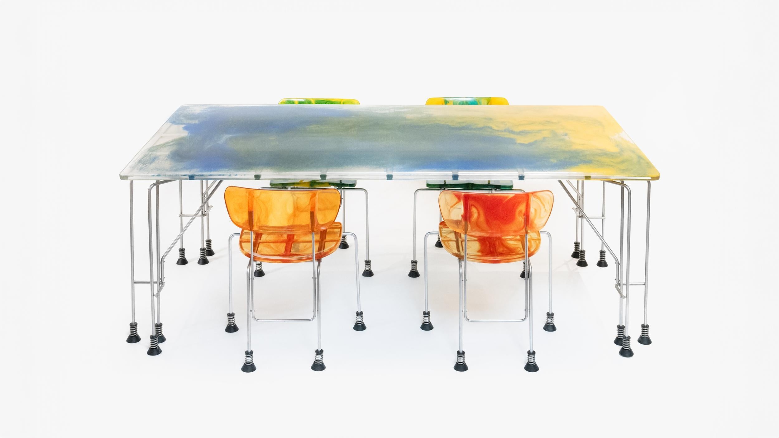 Gaetano Pesce Broadway Dining set. Set of four broadway chairs with a very rare Broadway 931 dining table.

1 of 11 examples, Broadway Dining Table 931 designed by Gaetano Pesce and produced by Bernini. The 543 Broadway series featured poured resign