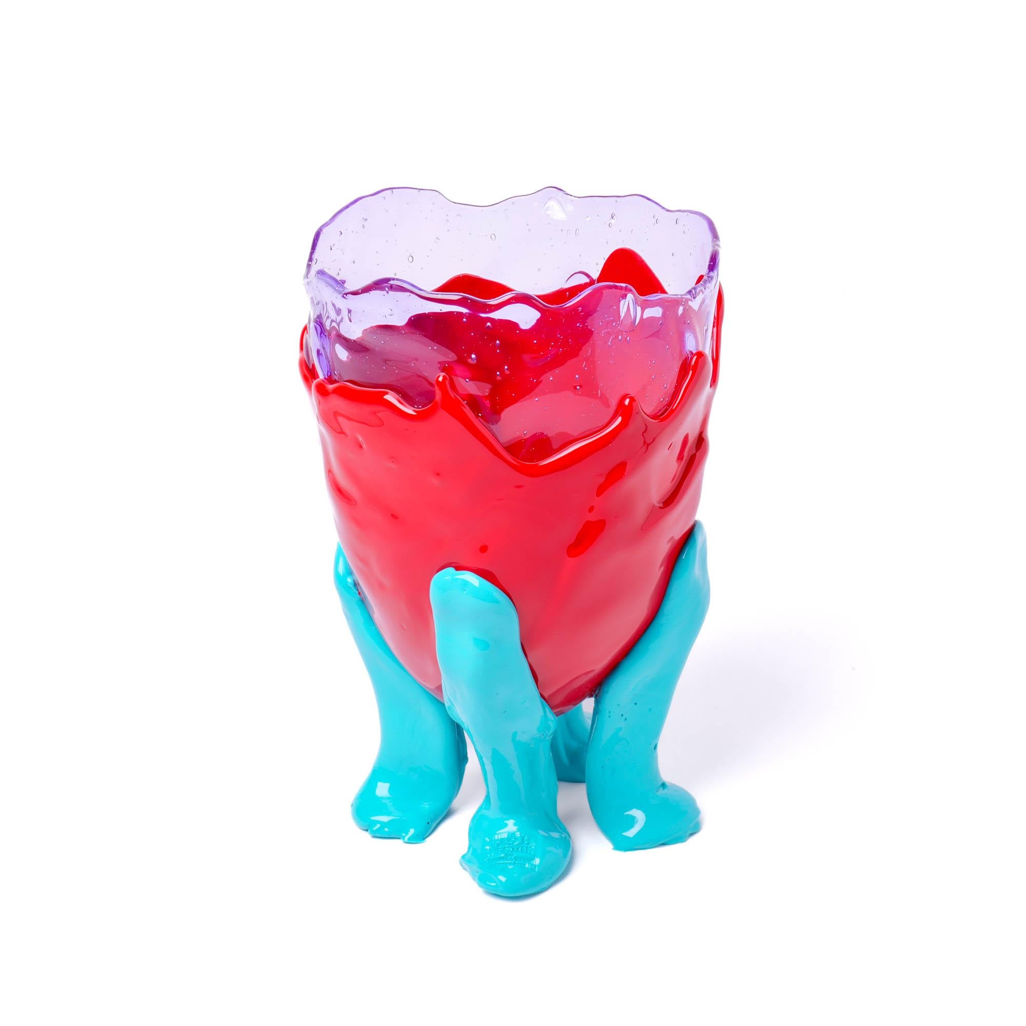 Clear extra colour vase - clear lilac, matt red, matt turquoise.
Vase in soft resin designed by Gaetano Pesce in 1995 for Fish Design collection.

Measures: M Ø 16cm x H 26cm
Colours: clear lilac, matt red, matt turquoise.
Material: RESIN
Vase in