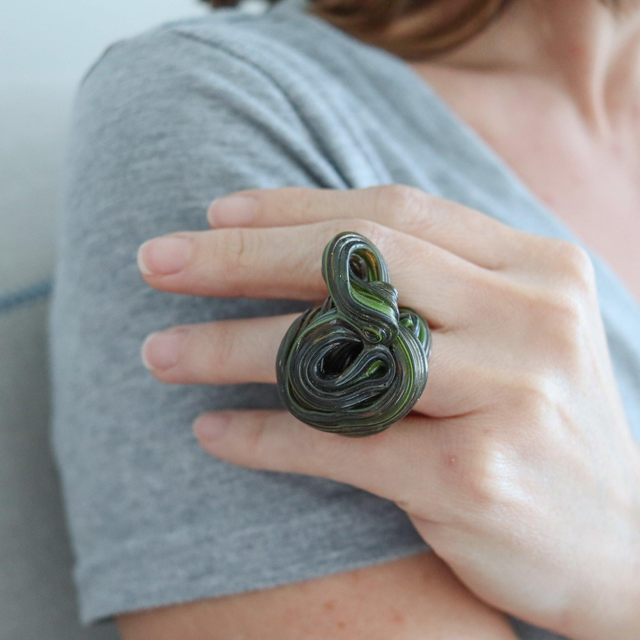 A rubber free form ring designed by Gaetano Pesce (1939-2024)

This is a very elusive sculptural ring created in Milano Italy by the architect Gaetano Pesce. The avant garde ring has been crafted in black and green rubber. Gaetano Pesce is known for
